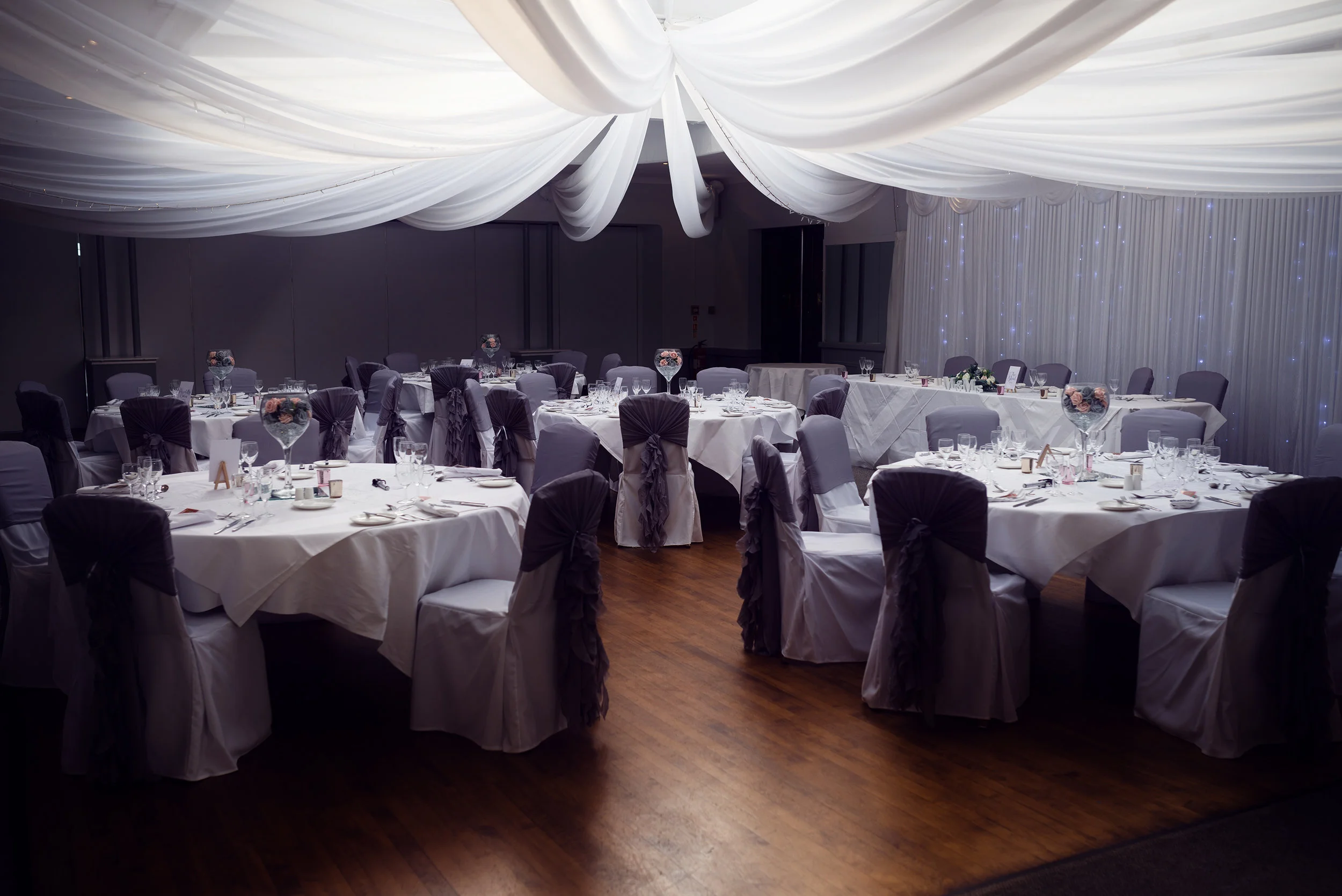 Wedding breakfast room setup at Stirk House