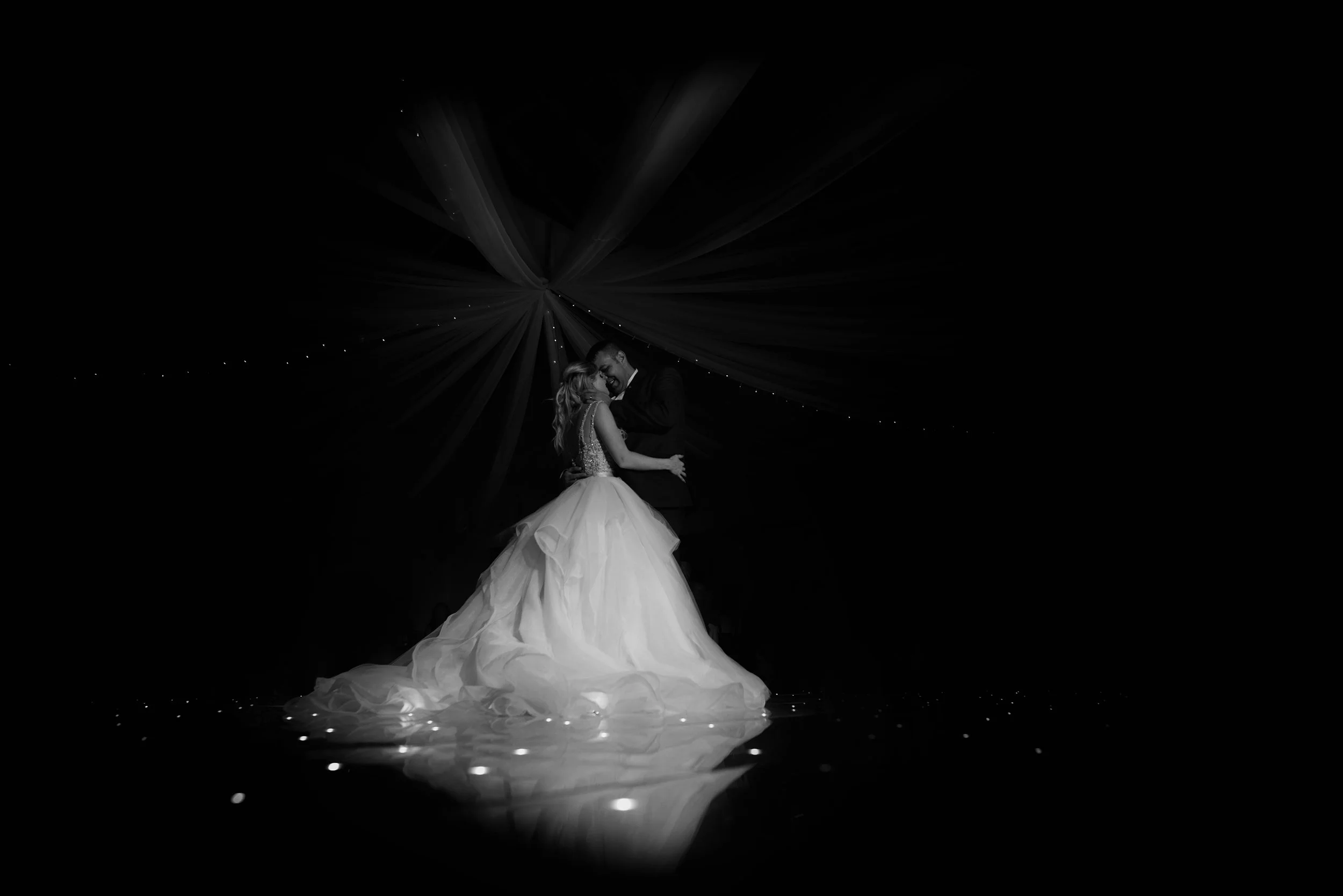 The happy couple first dance