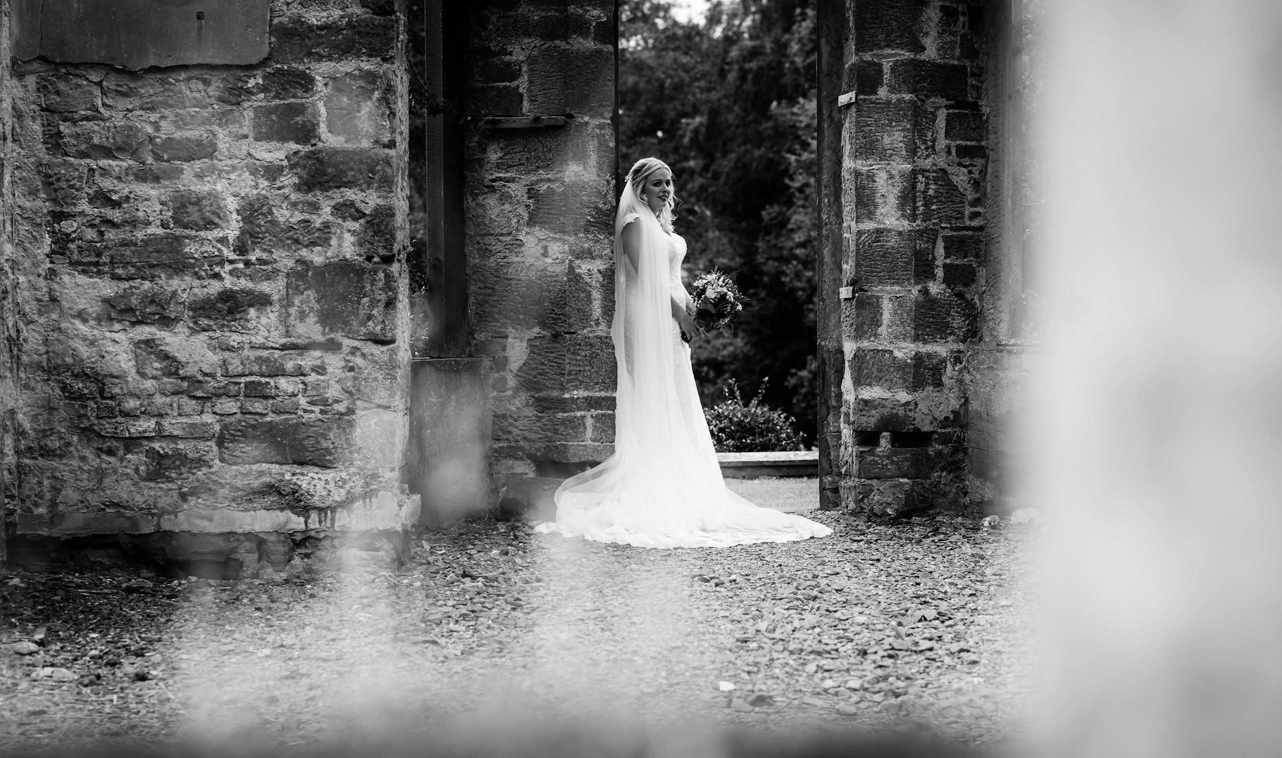 Bride only portrait black and white in a doorway