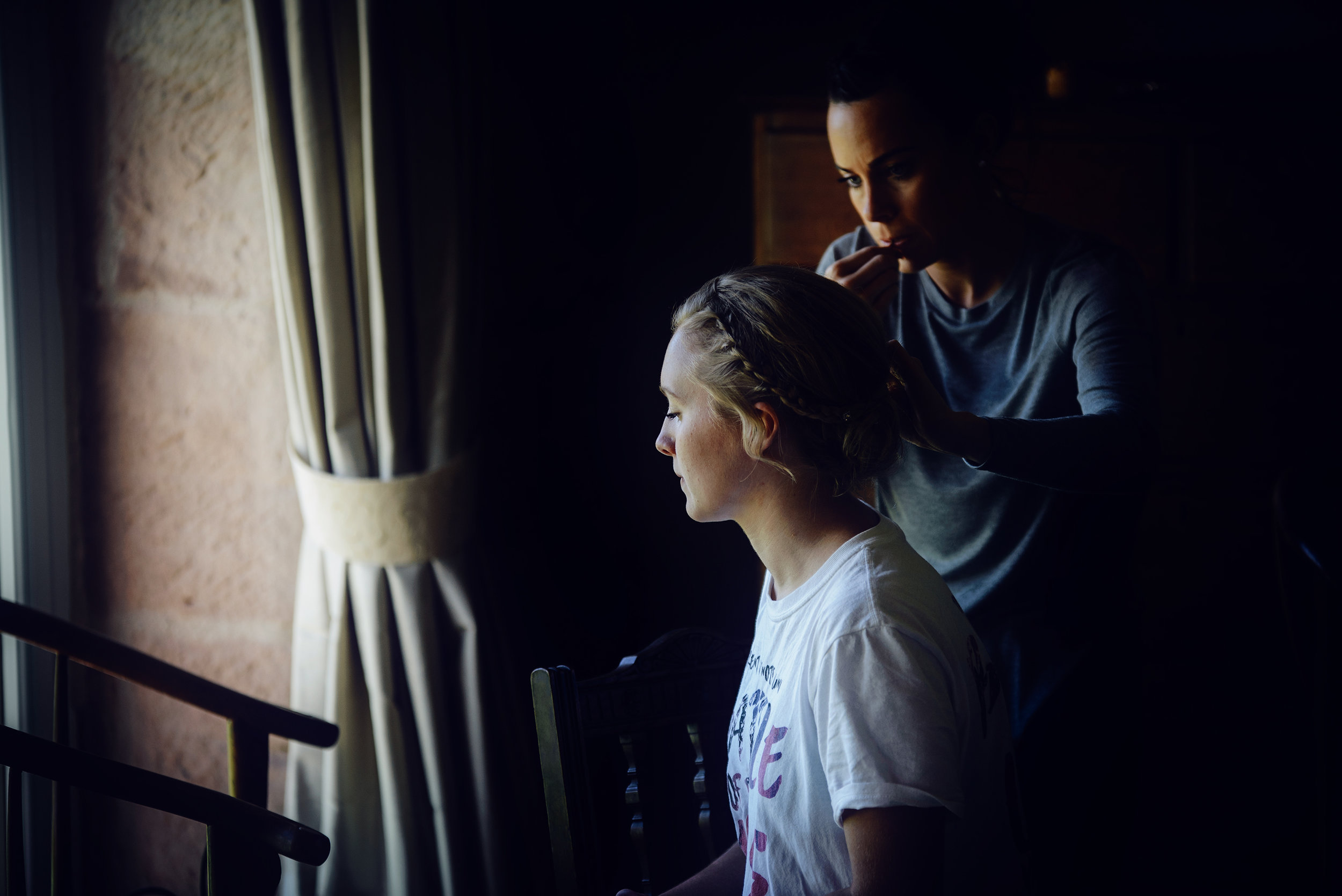 Bridesmaid having her hair and makeup done