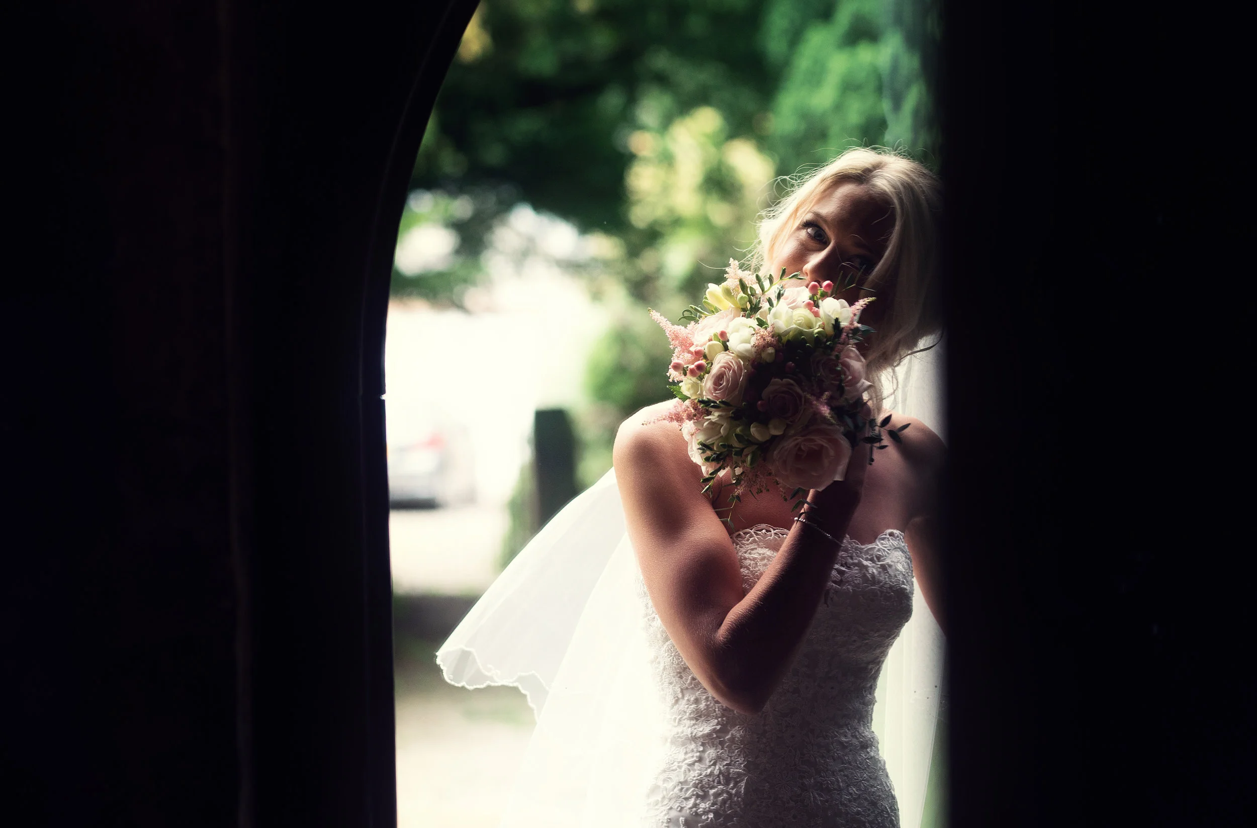 The bride just as she enters the church I think the nerves are starting to get to her