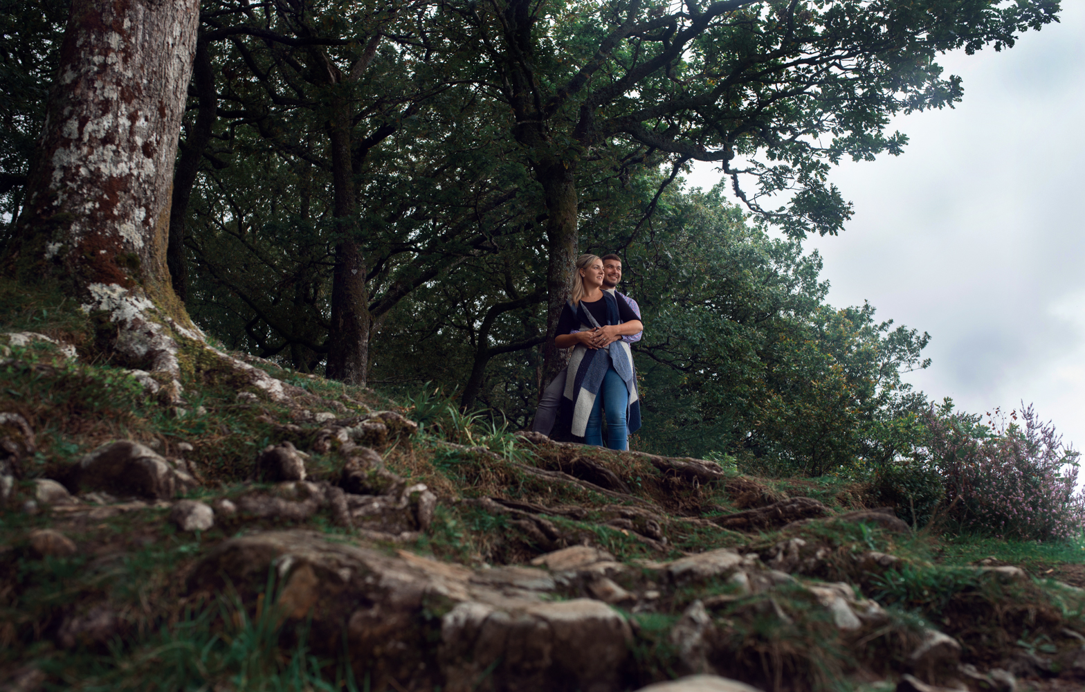 Couple looking out over the lake from the top of surprise view