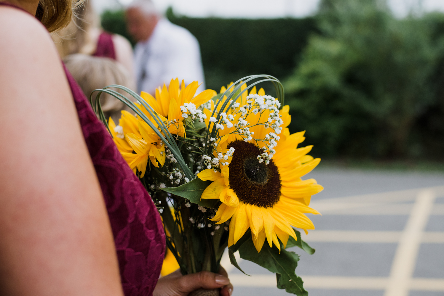 Sunflowers everywhere the bridesmaids bouquet