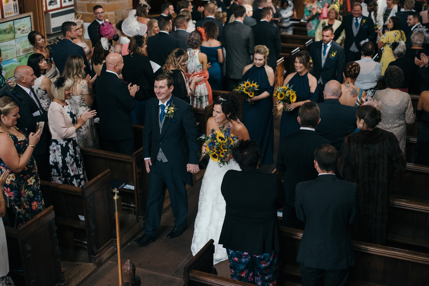 Bride and groom leaving the church