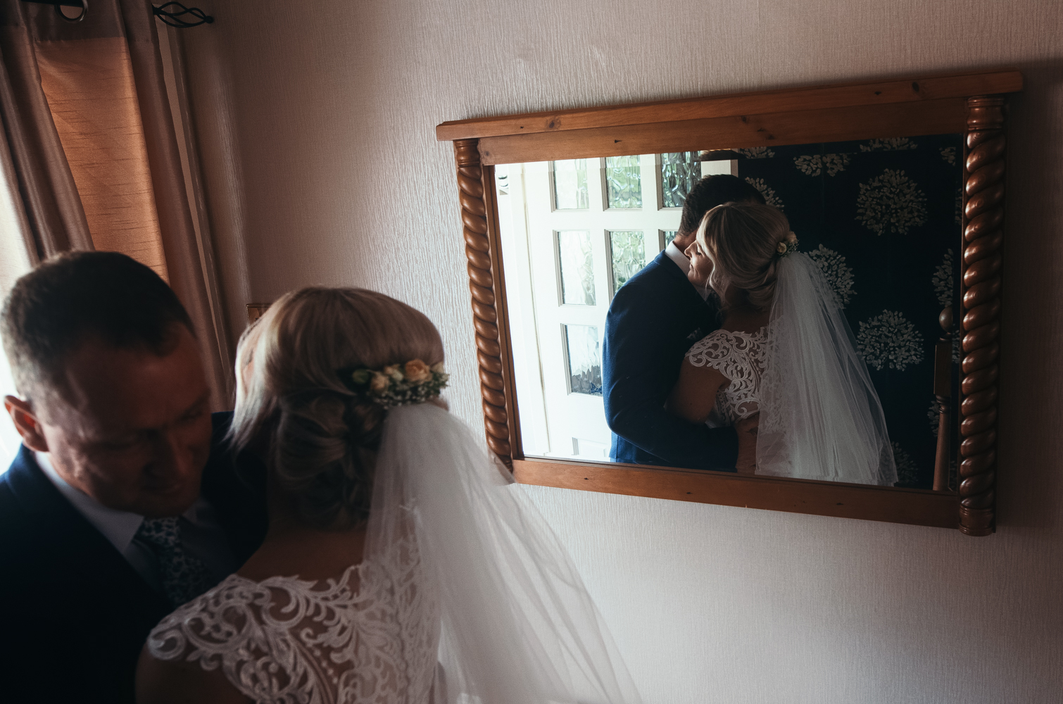 Bride and father during the wedding dress reveal