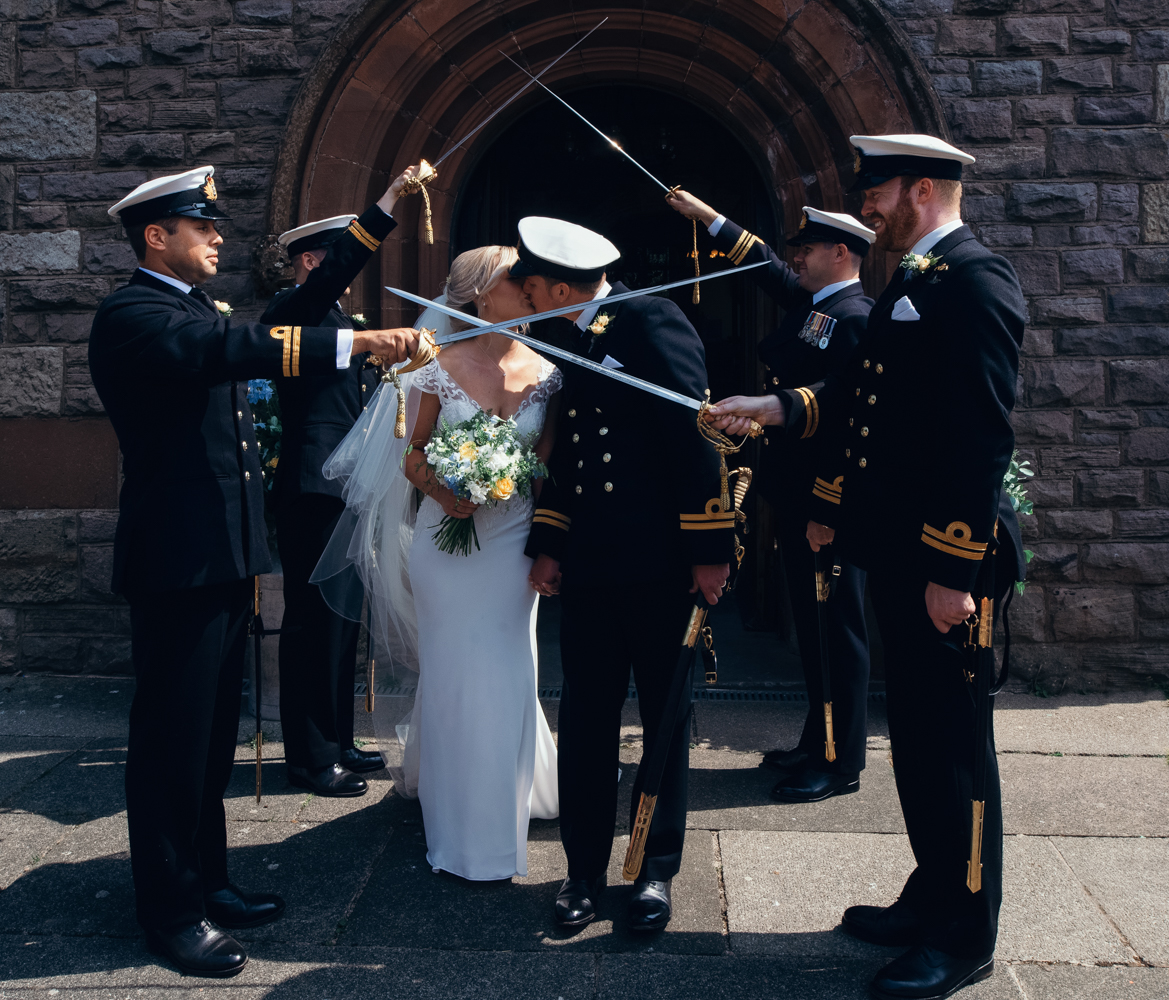 You shall not pass until you kiss exiting the church during the guard of honour