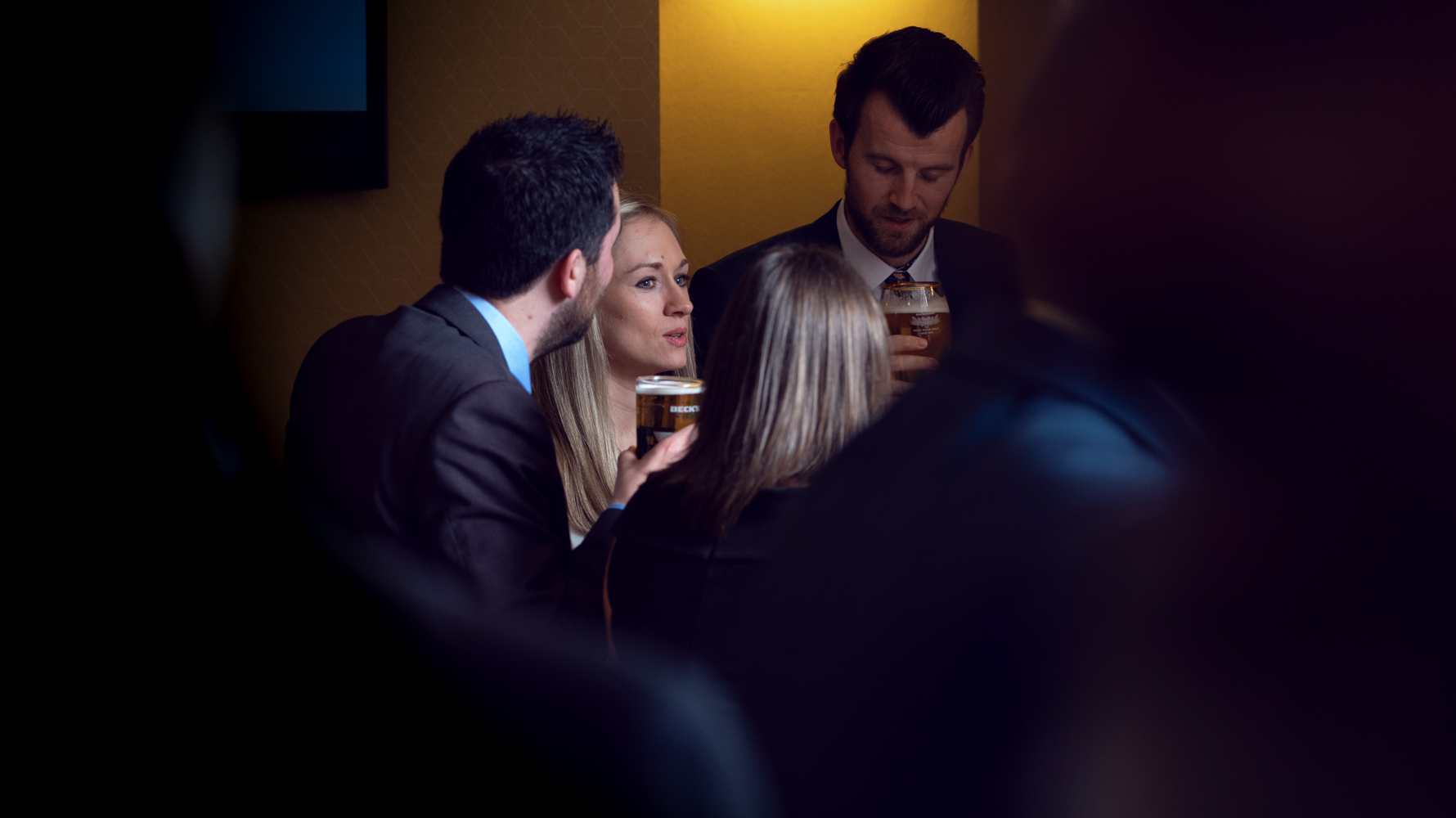 Another moody photo of one of the wedding guests during the drinks reception