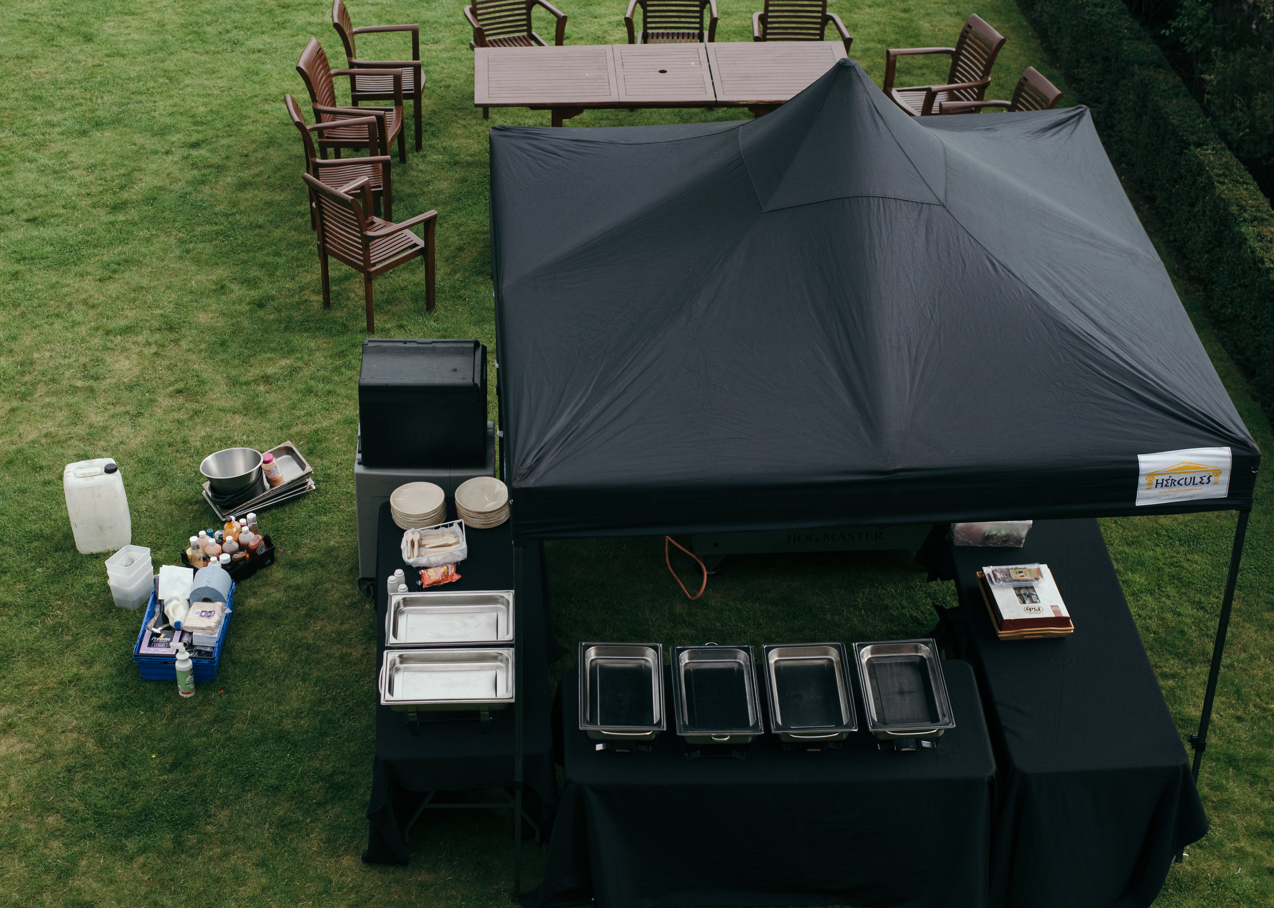 The caterers setting up for the afternoon barbecue