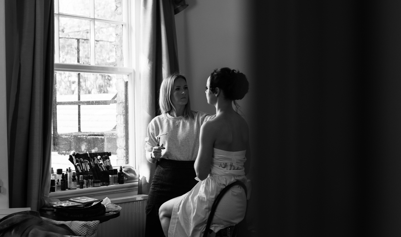 Jessica the bride having her makeup done