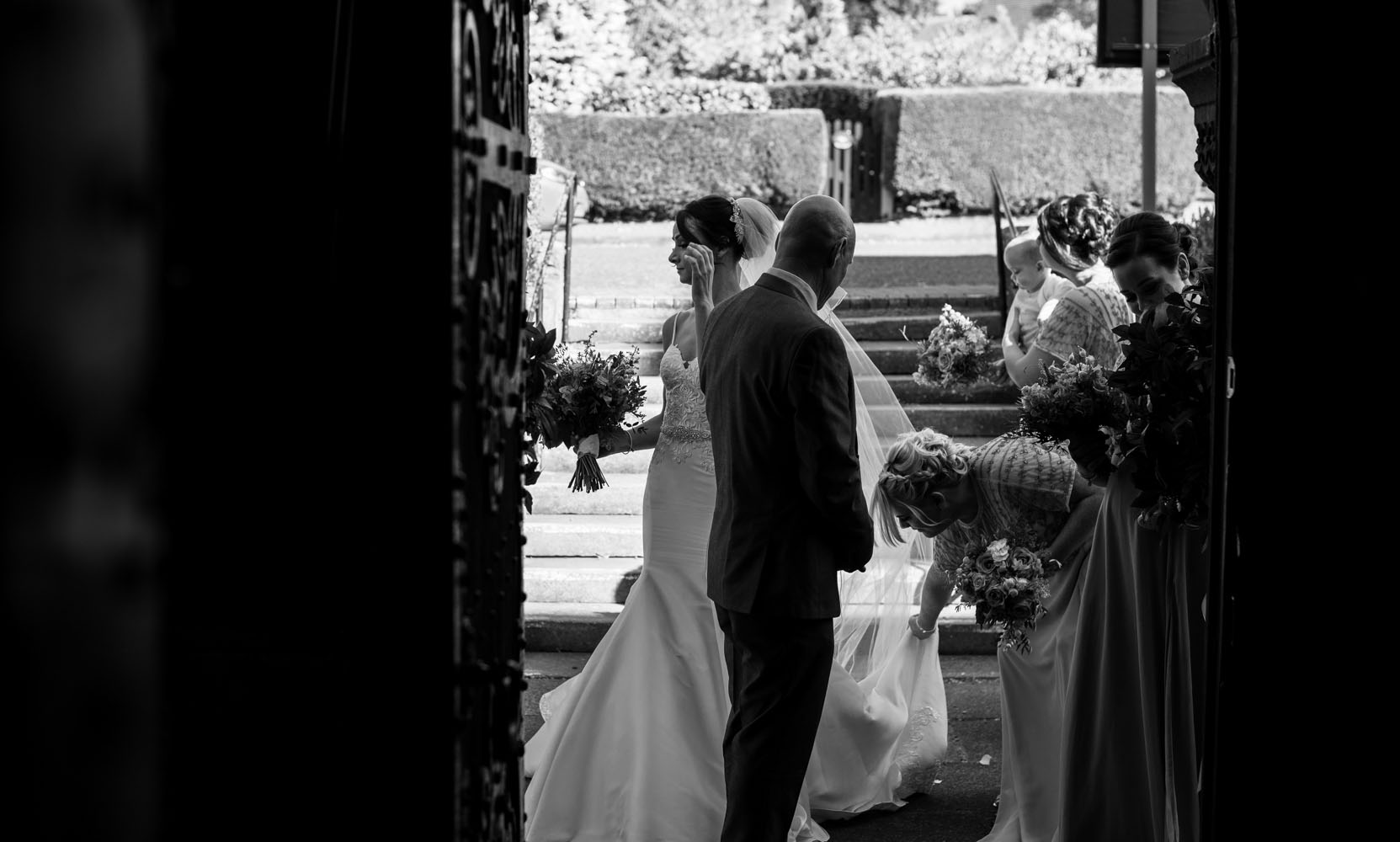 Almost there - the brides final preparations before entering church