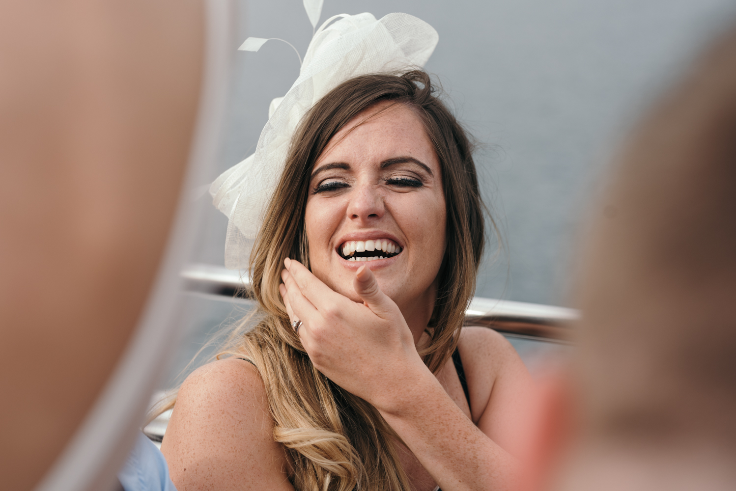 One of the wedding guests goofing around during the lake cruise