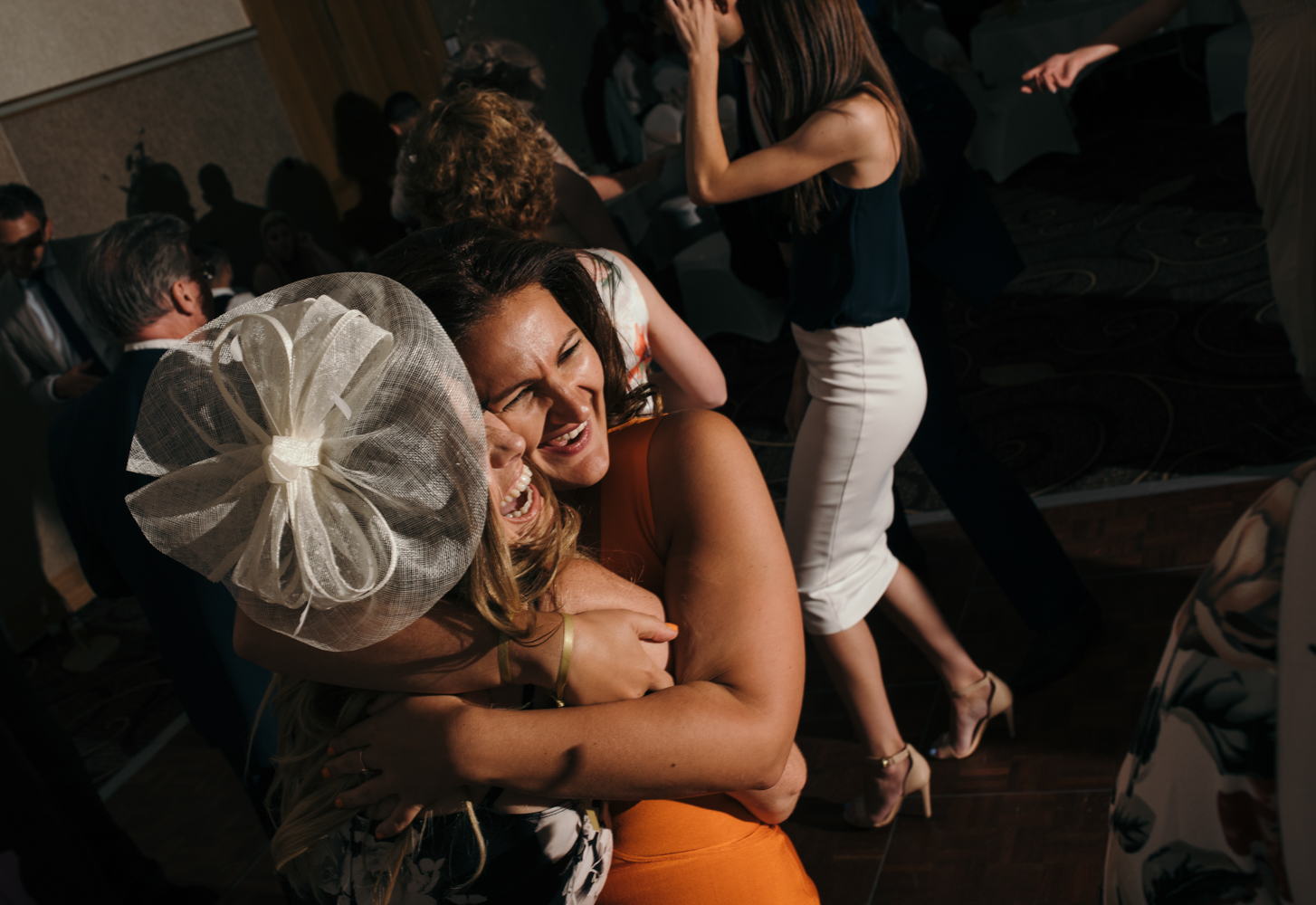 Two guests decide to have a hug on the dancefloor