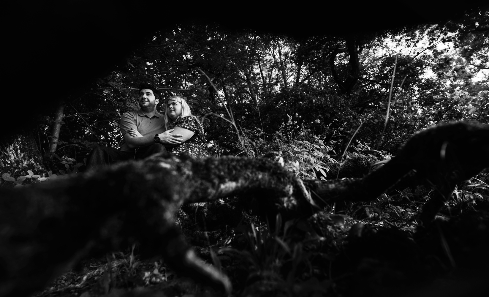 Pre shoot - A couple sitting at the waters edge Derwent Water in the Lake district