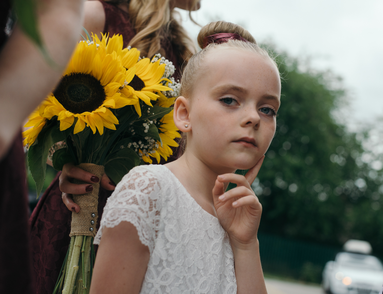 One of the young bridesmaids pulling a pose