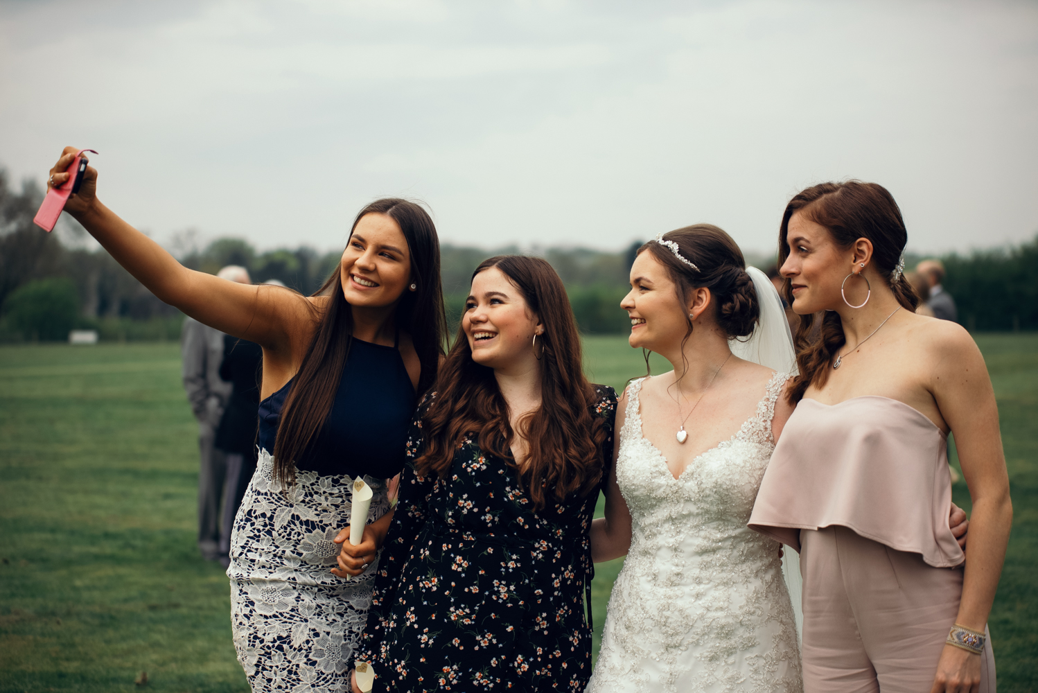 The bride and some of her friends taking a selfie.jpg