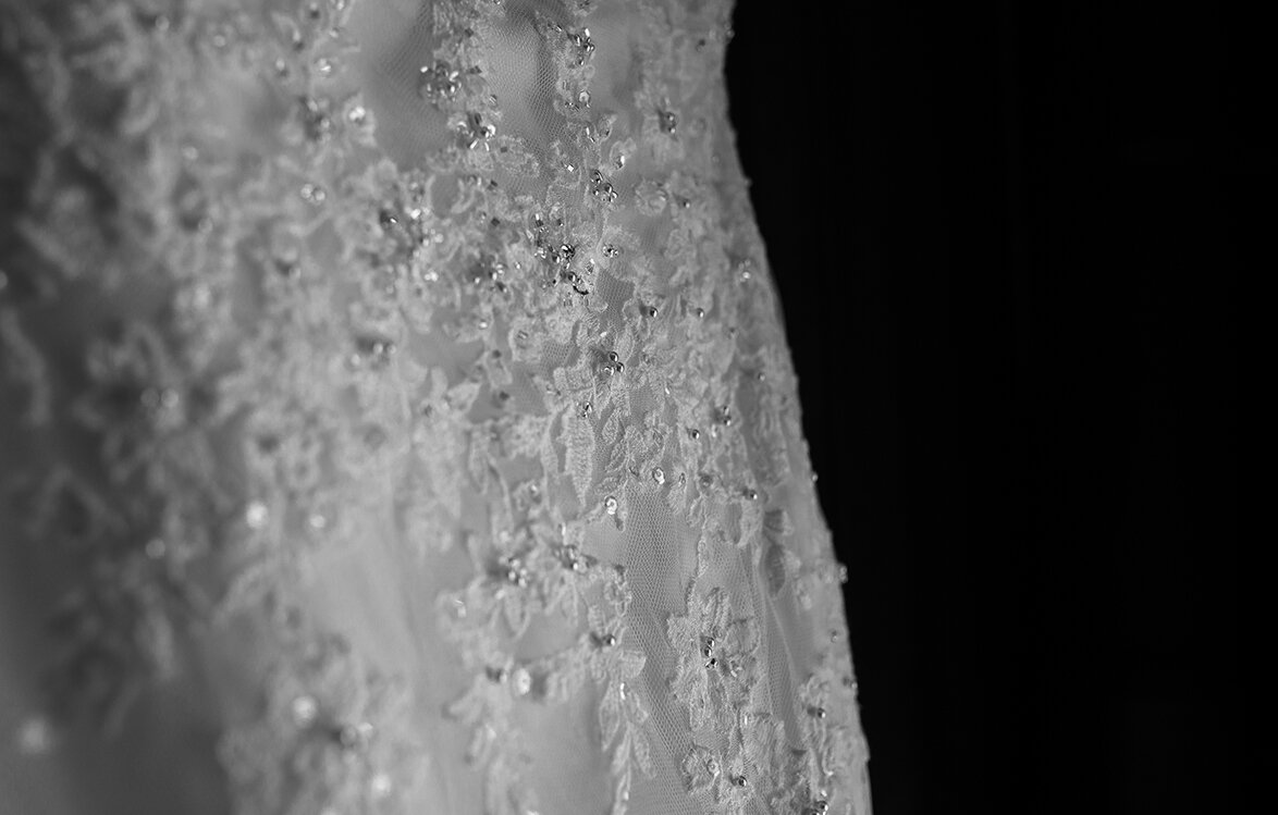 A close up shot of the wedding dress details