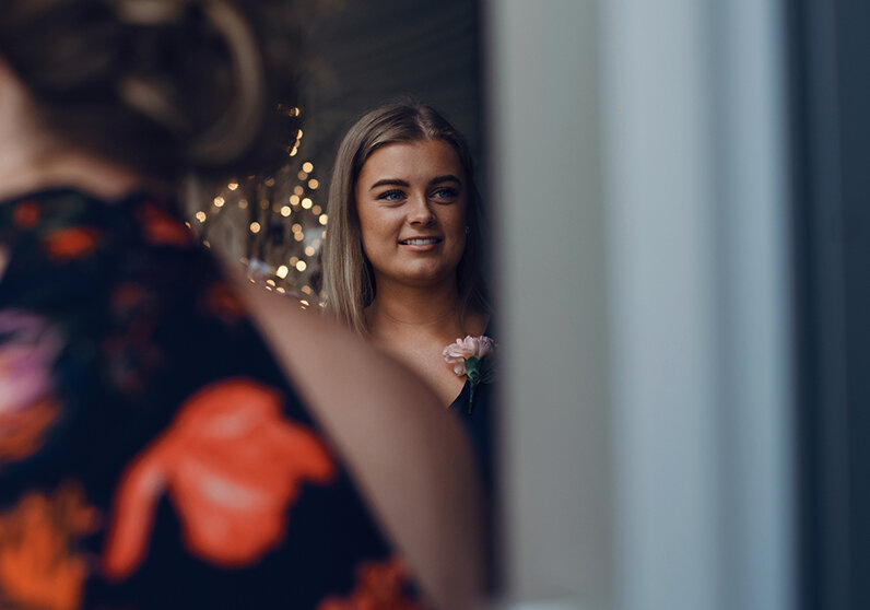 One of the wedding guests chatting to other guests