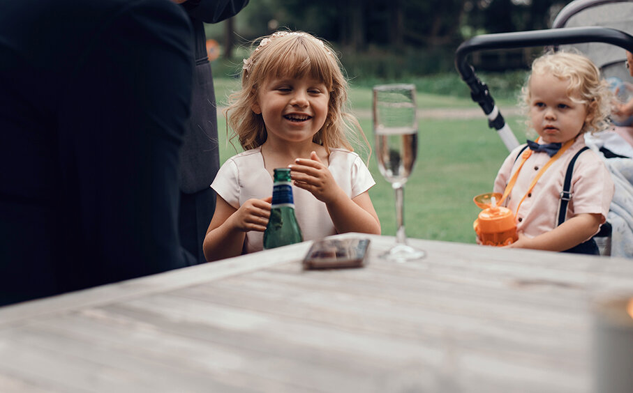 One of the flower girls having a chuckle