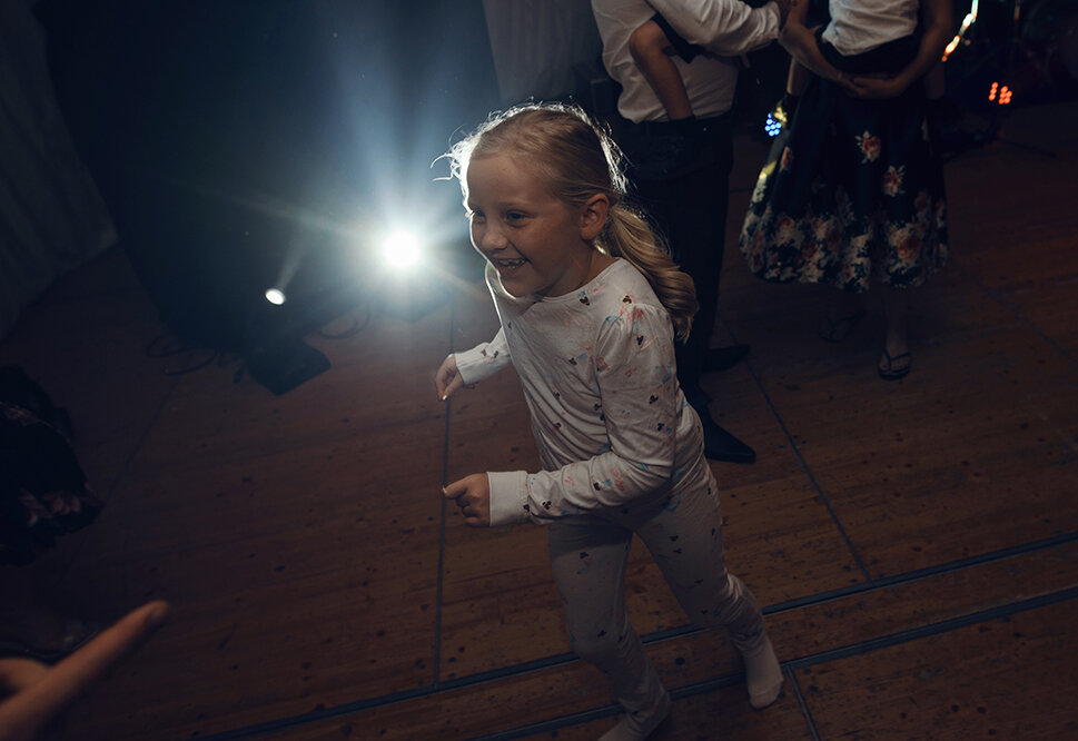 One of the flower girls dancing in her pj's