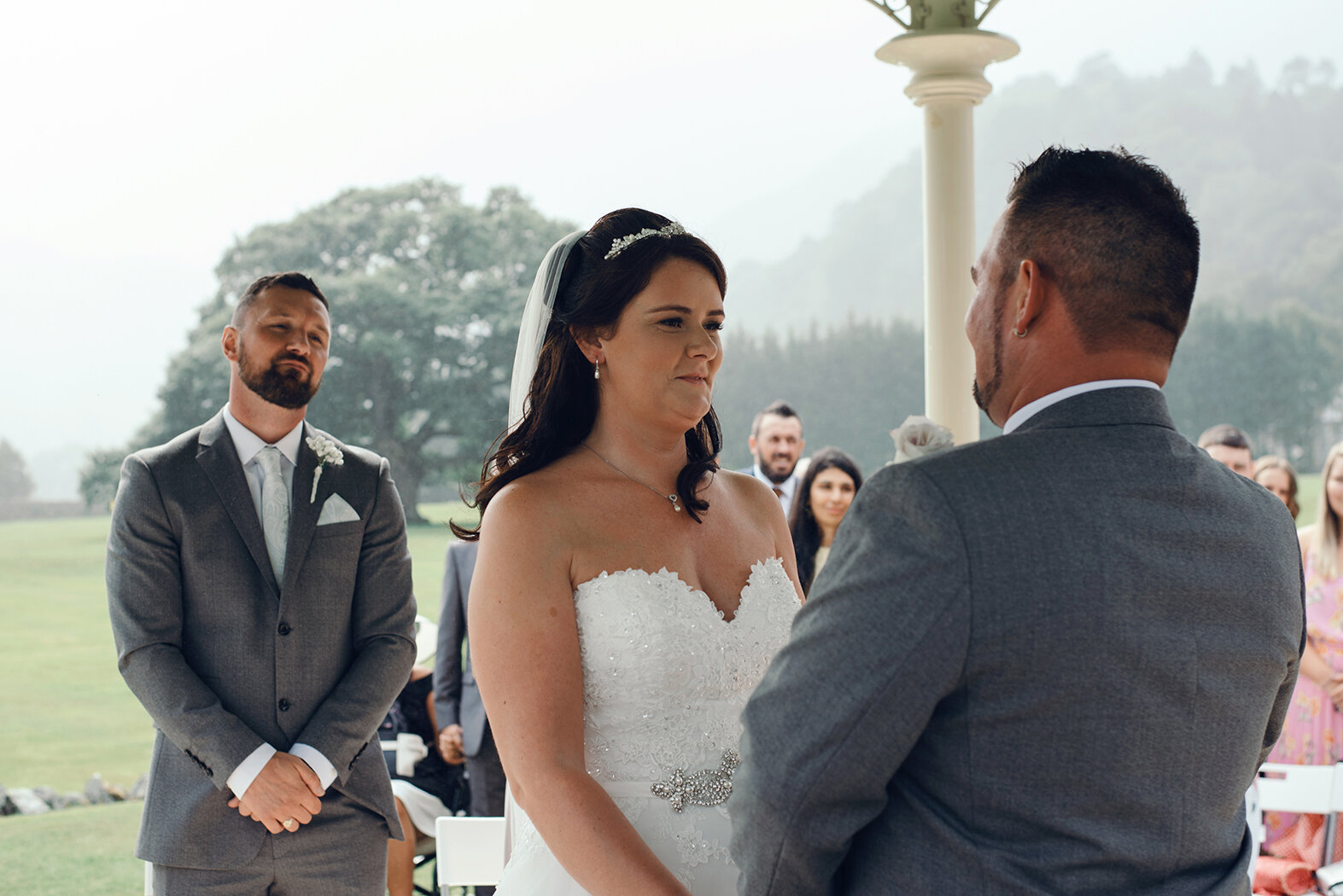 The bride and groom exchanging vows during the wedding ceremony