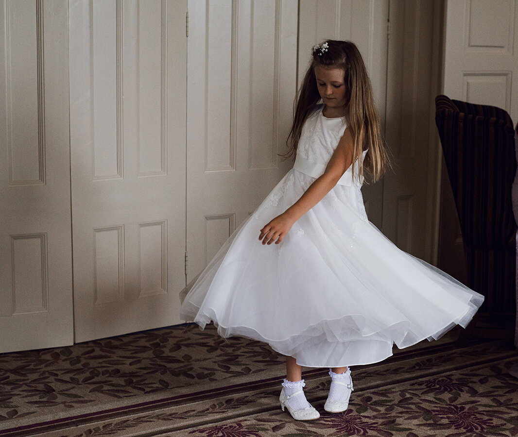 A twirling flower girl