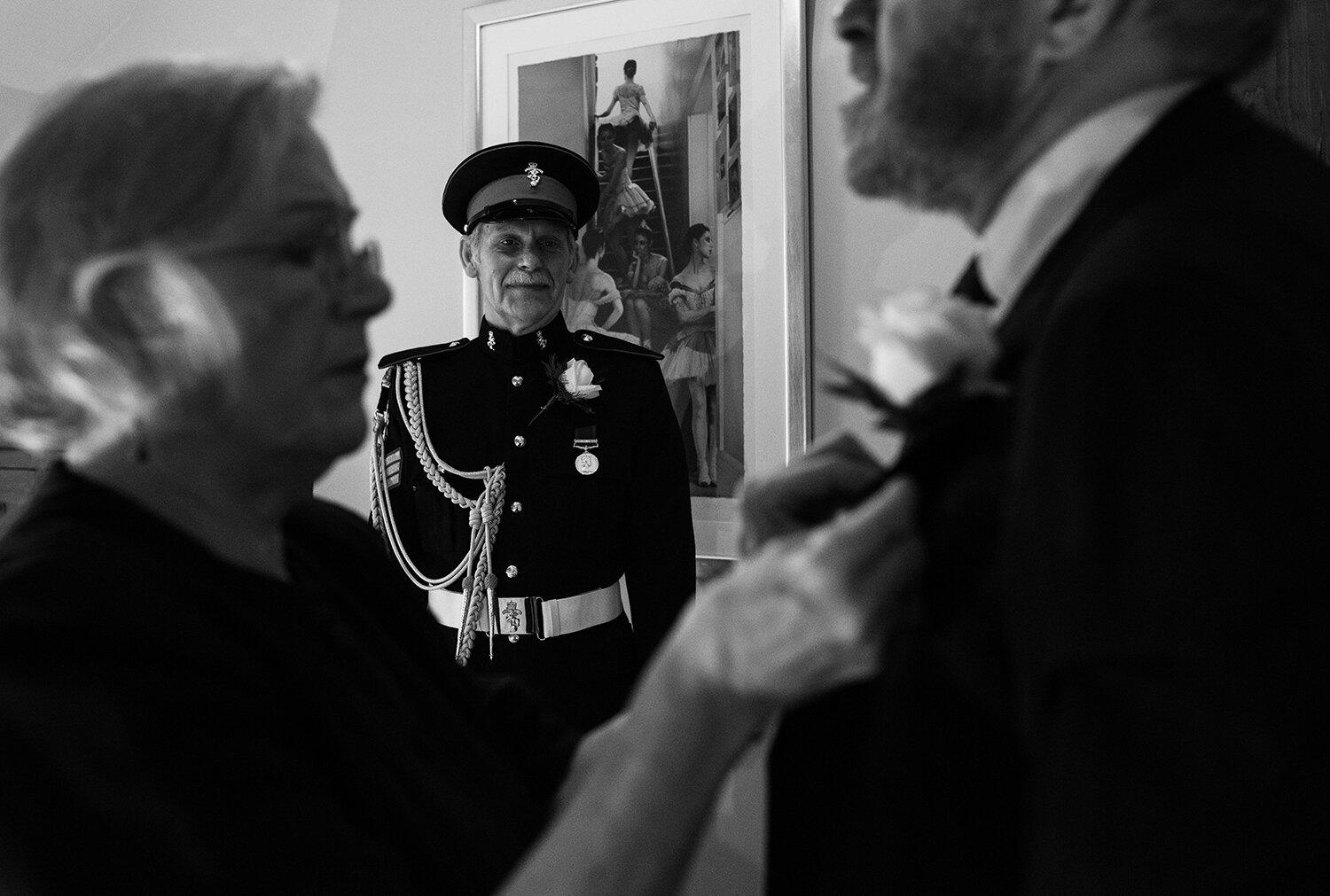 A black and white photo of the groom