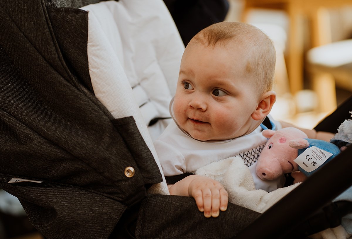 Little baby guest enjoying the drinks reception