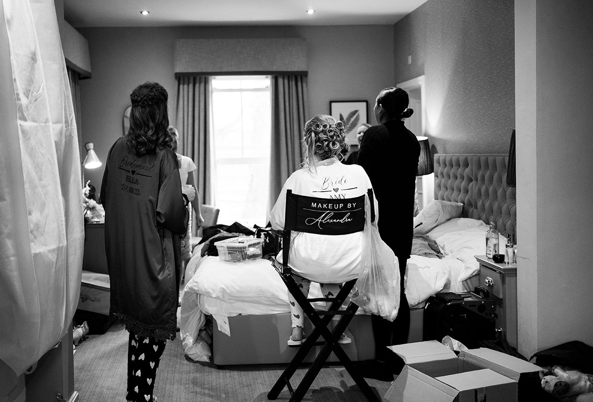 Black and white image of morning bridal preparations