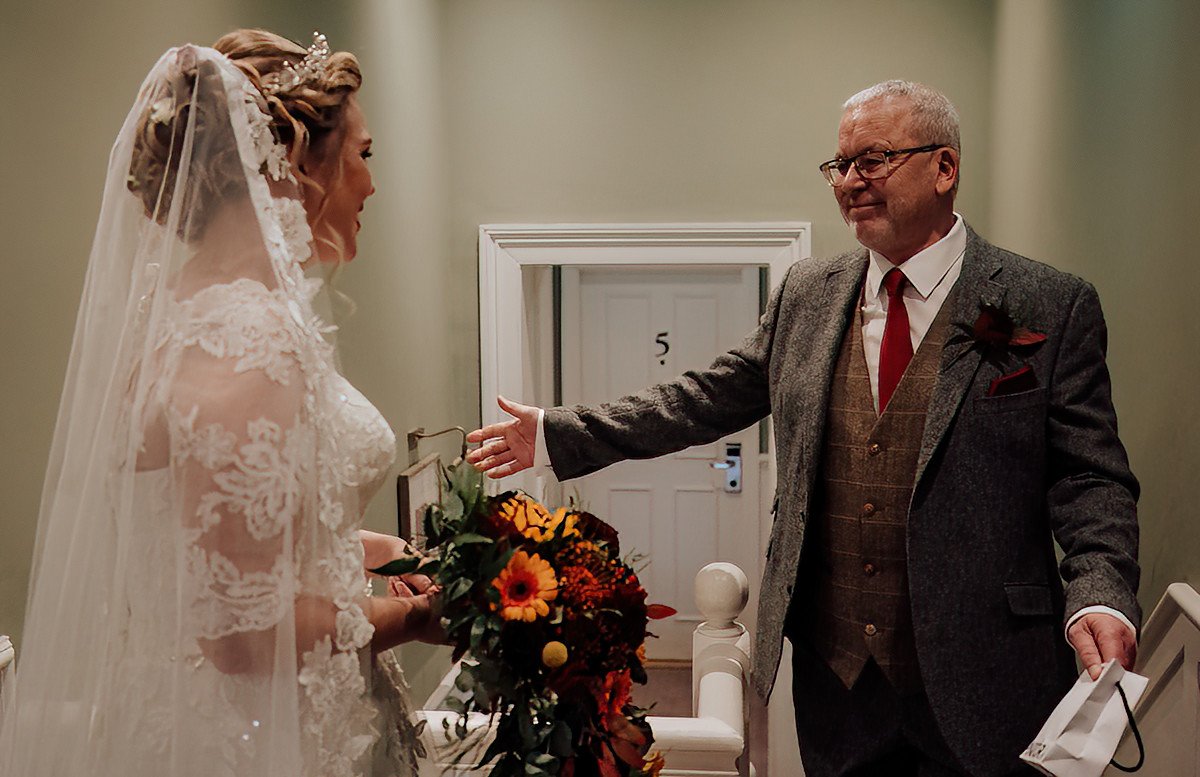 The bride and her father first look reveal