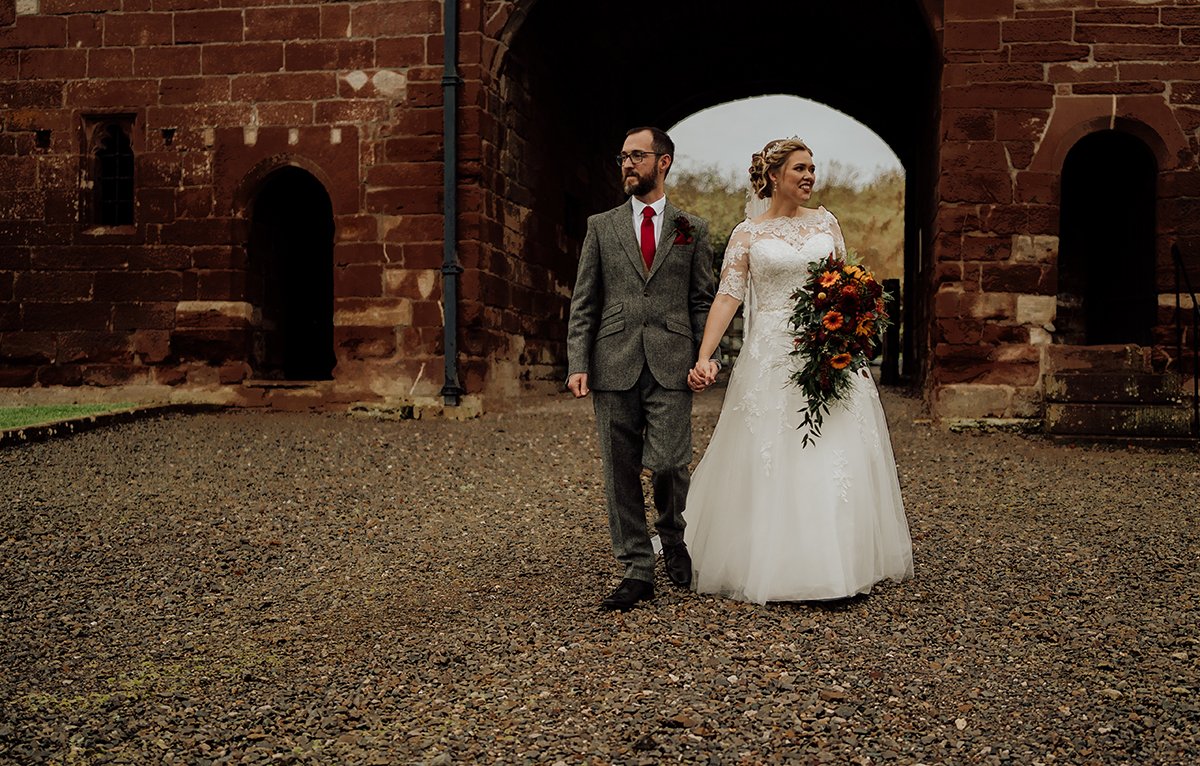 The bride and groom walking during the couples shoot