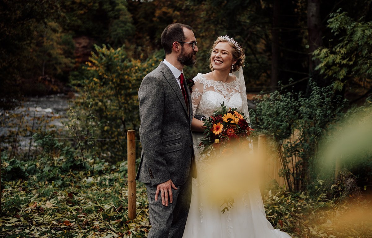 The bride and groom chatting during couples shoot