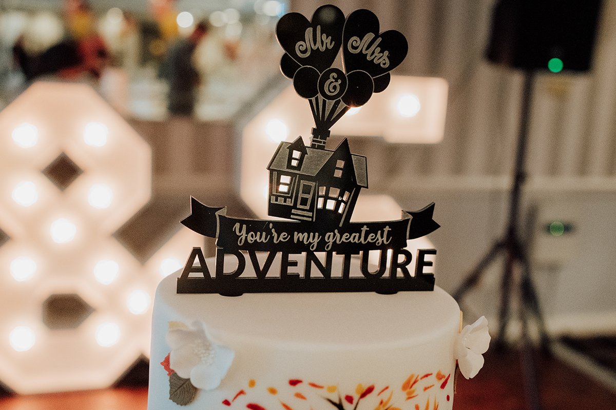 The decoration on top of the wedding cake