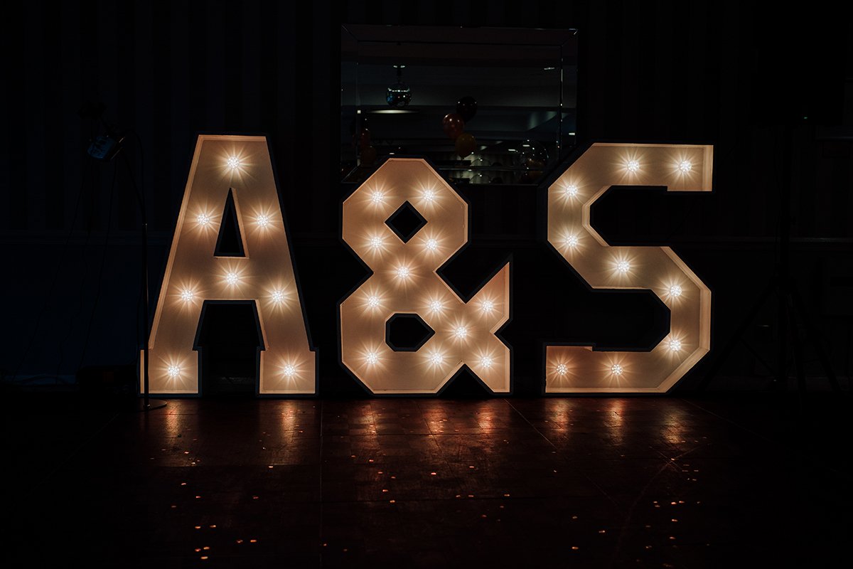 Illuminated sign of the couples first names