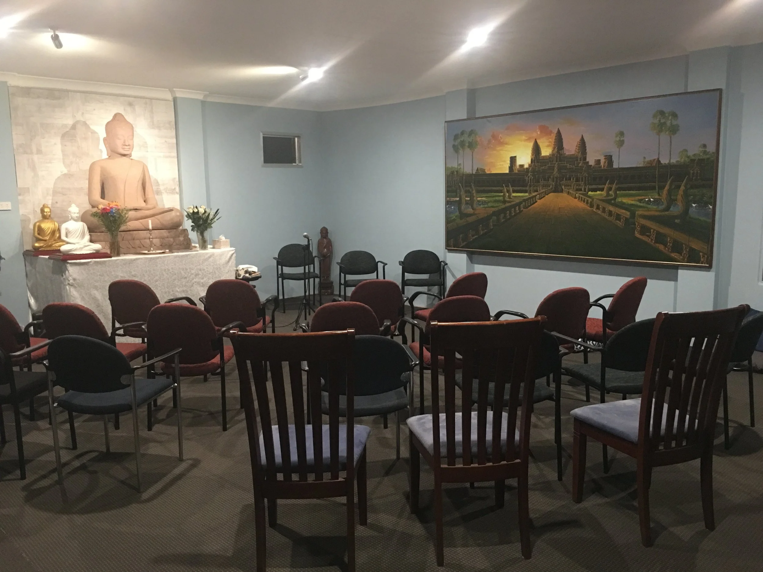 Getting the seating in the Vihara ready for the Meditation conducted by Ajahn Khemavaro on Monday on 27 May 2019.