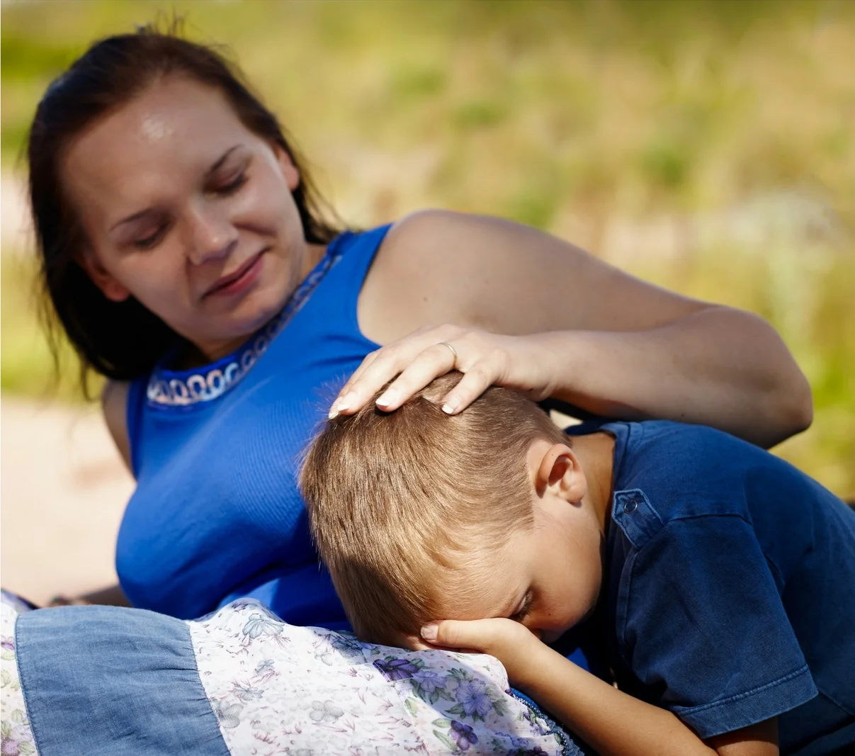 image of adult comforting child