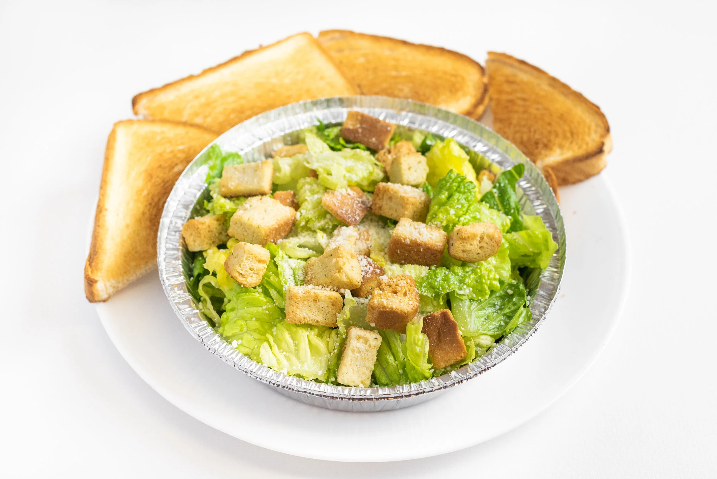 VarsityPizza_Subs(VarsityDr.NW)_CaesarSalad_1.jpg