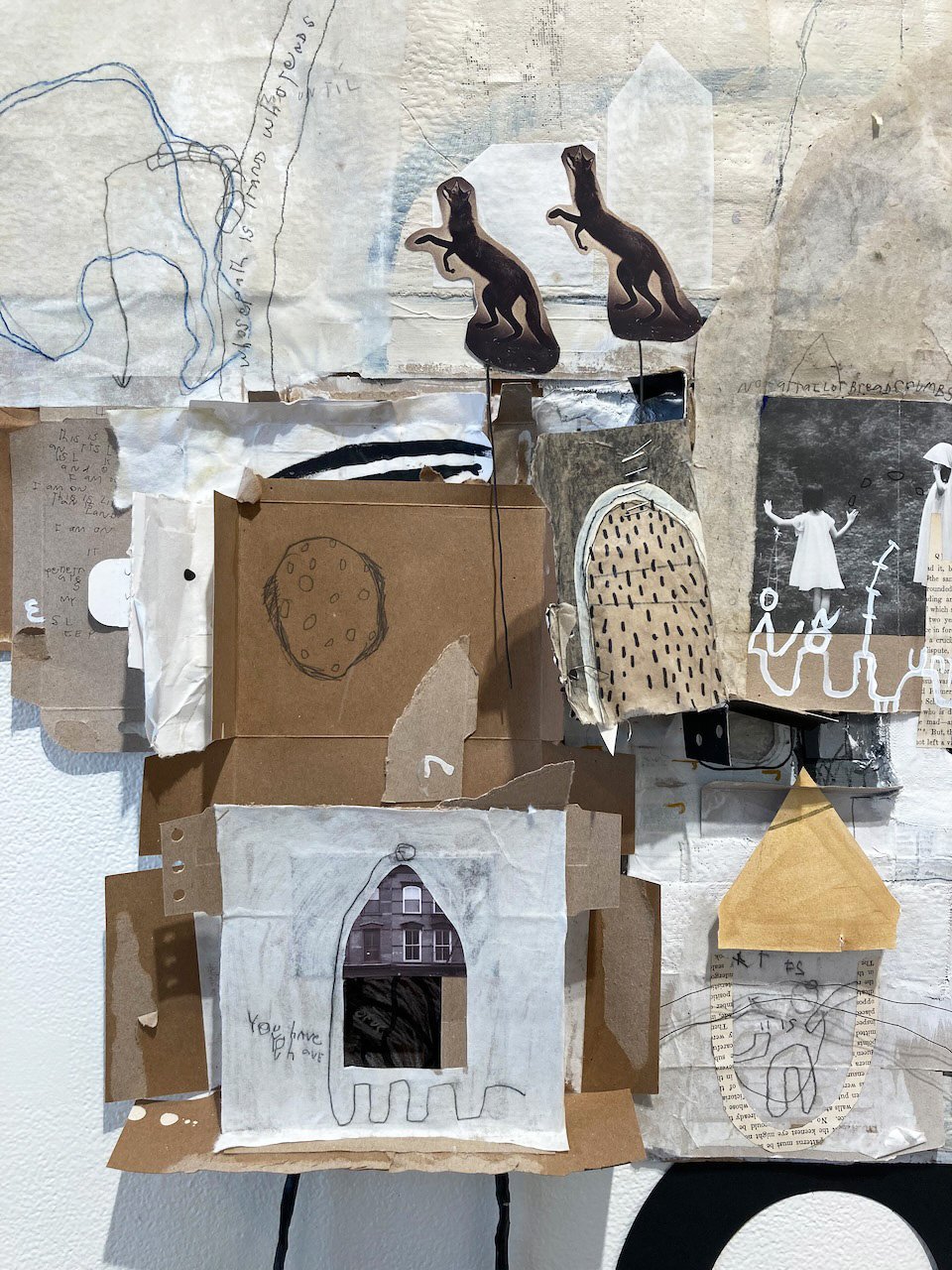   Not Lost in the Woods , 2023. Packaging, cardboard, AI generated imagery, acetate, wire, clay, ink, graphite, gouache. 