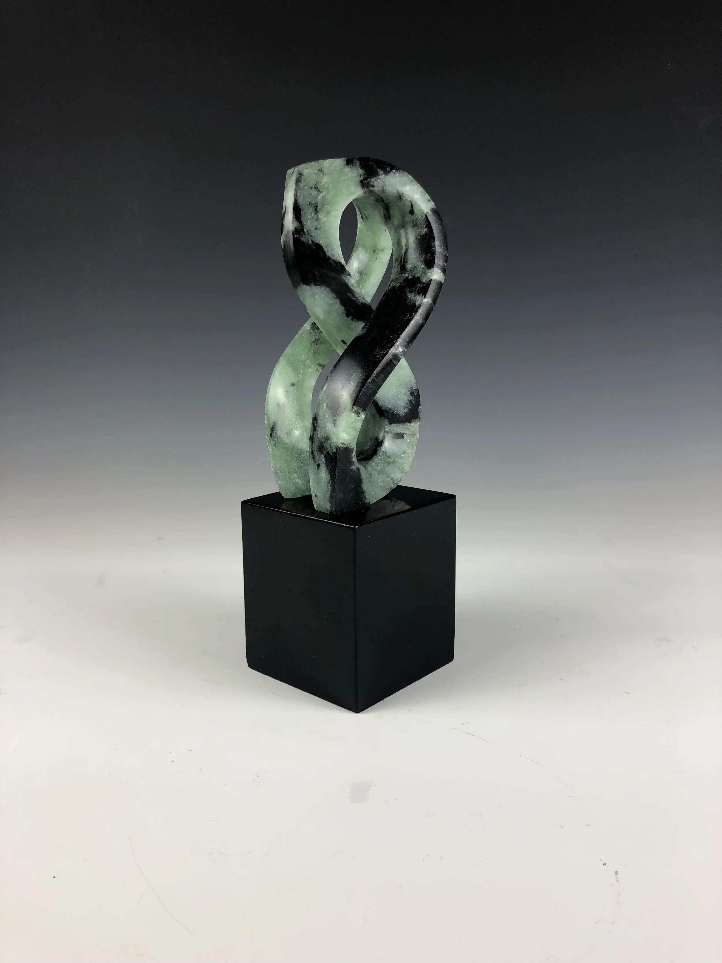 Mike McCarthy, Serpentine, soapstone on lacquered wood base, $495