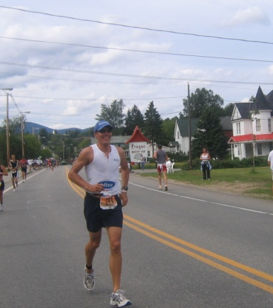 Peter crushing the run at Ironman lake Placid, 2004.