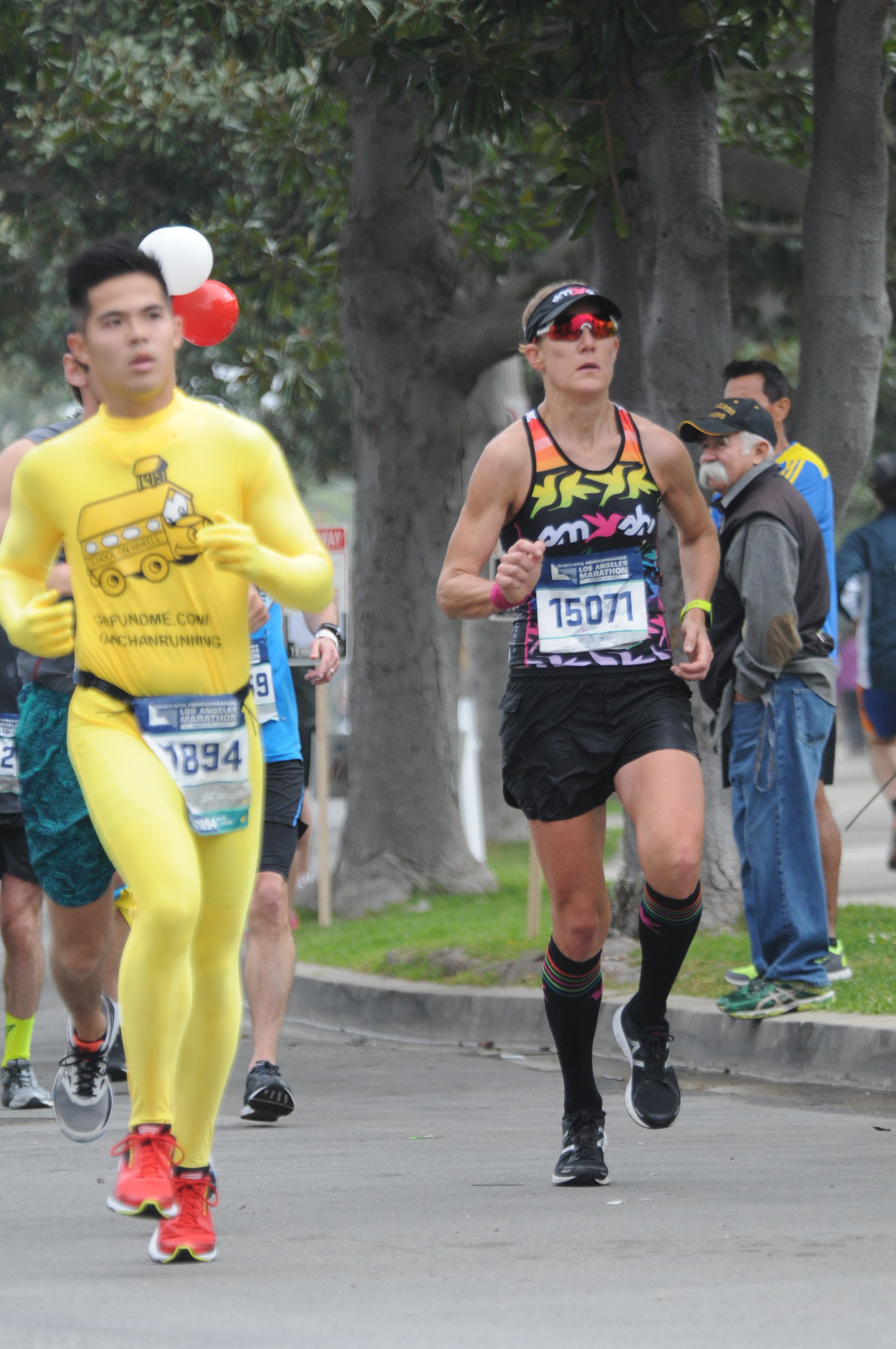 I love this photo, I think I look pretty tough, but for the record, the guy in the yellow onesie beat me across the finish line. 