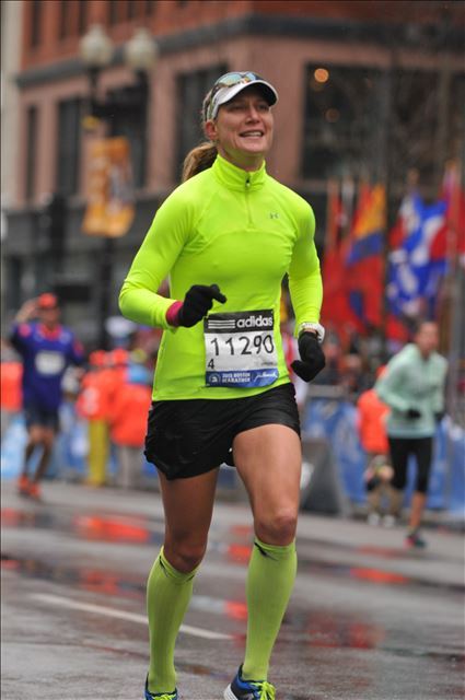Yours truly running toward her second Boston marathon finish, 2015.