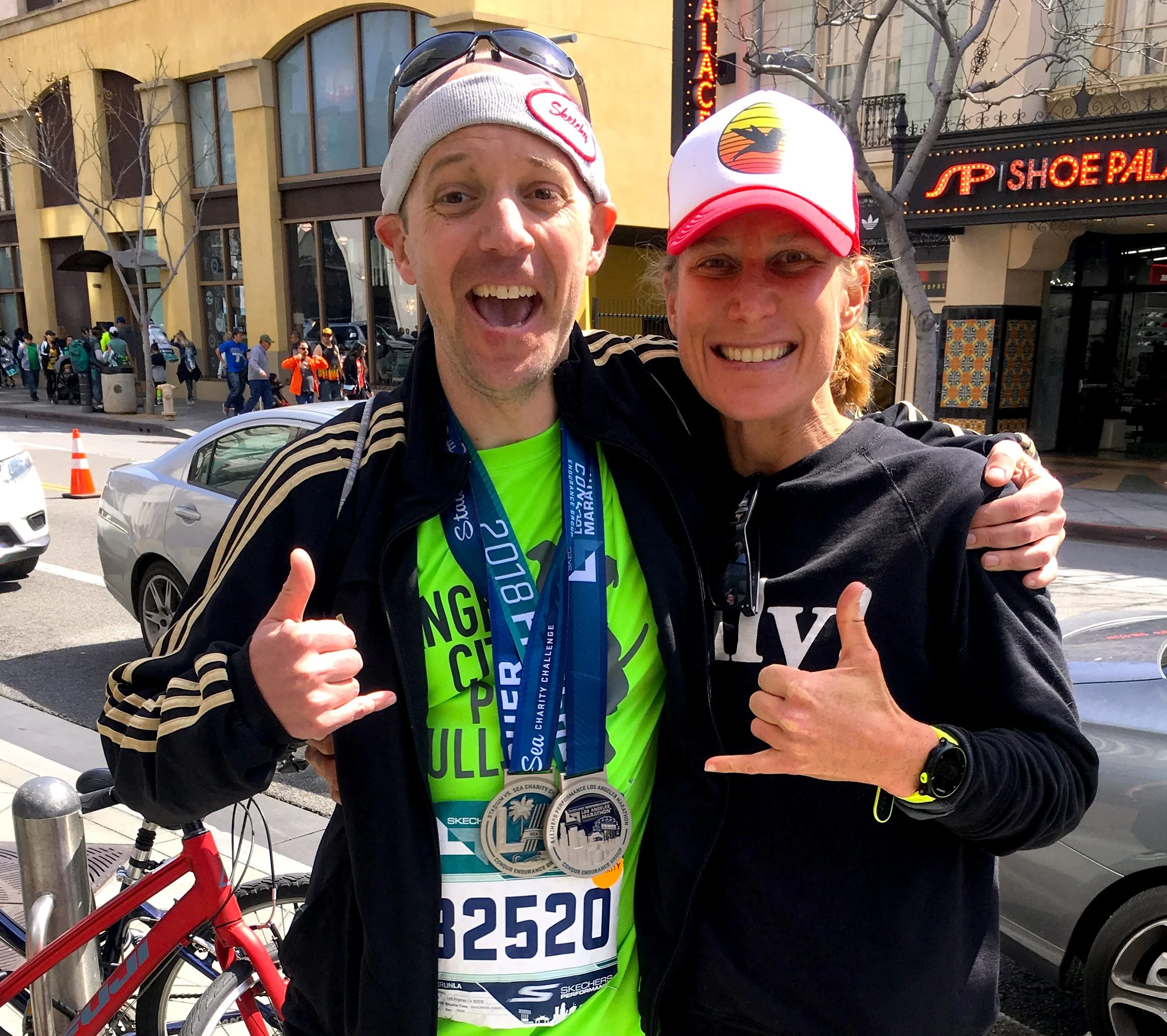 Ned and his coach celebrating after he finished the LA Marathon.