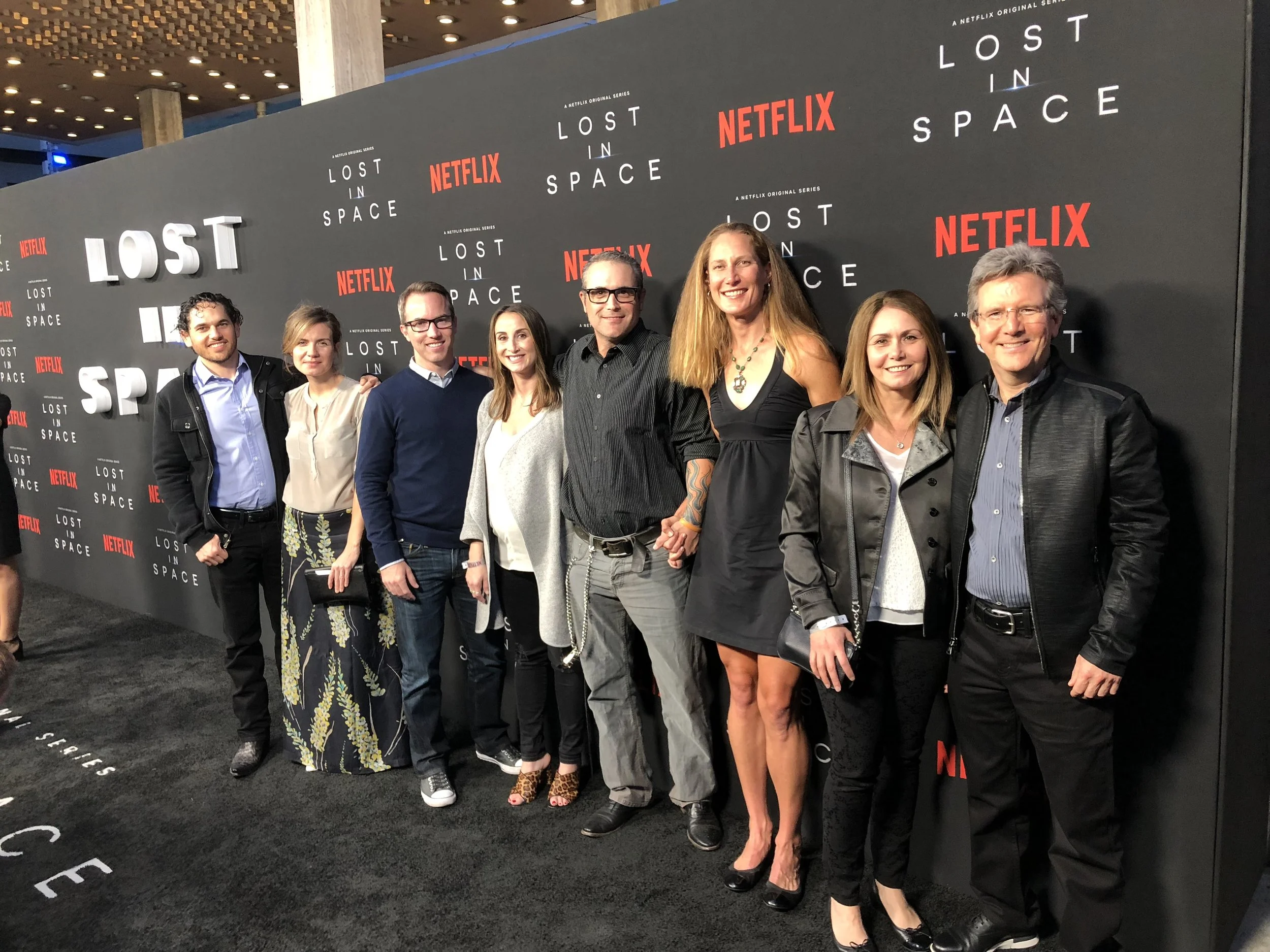 The Lost In Space VFX team and their teammates sneaking a photo on the step and repeat after the stars had all shuffled through. Thank you Netflix marketing team!