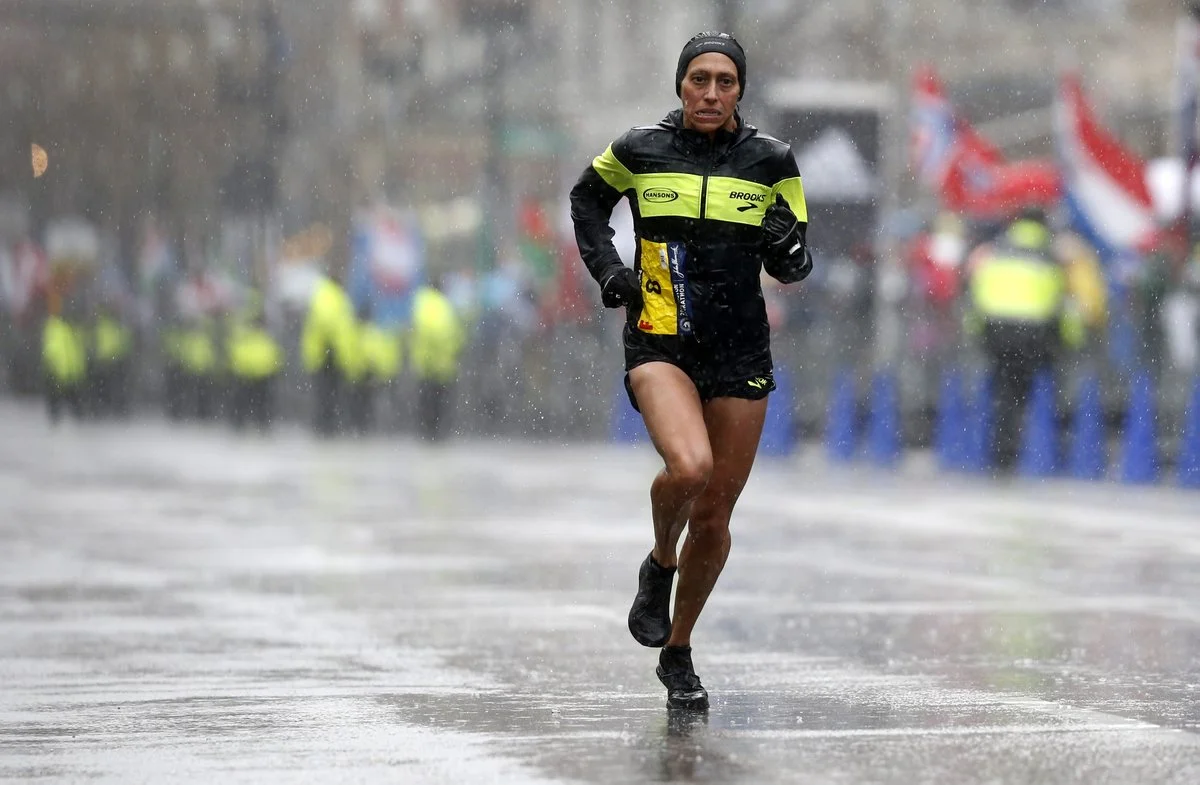 This photo of the women's winner, Desiree Linden, says it all. It was a tough race for all of us.