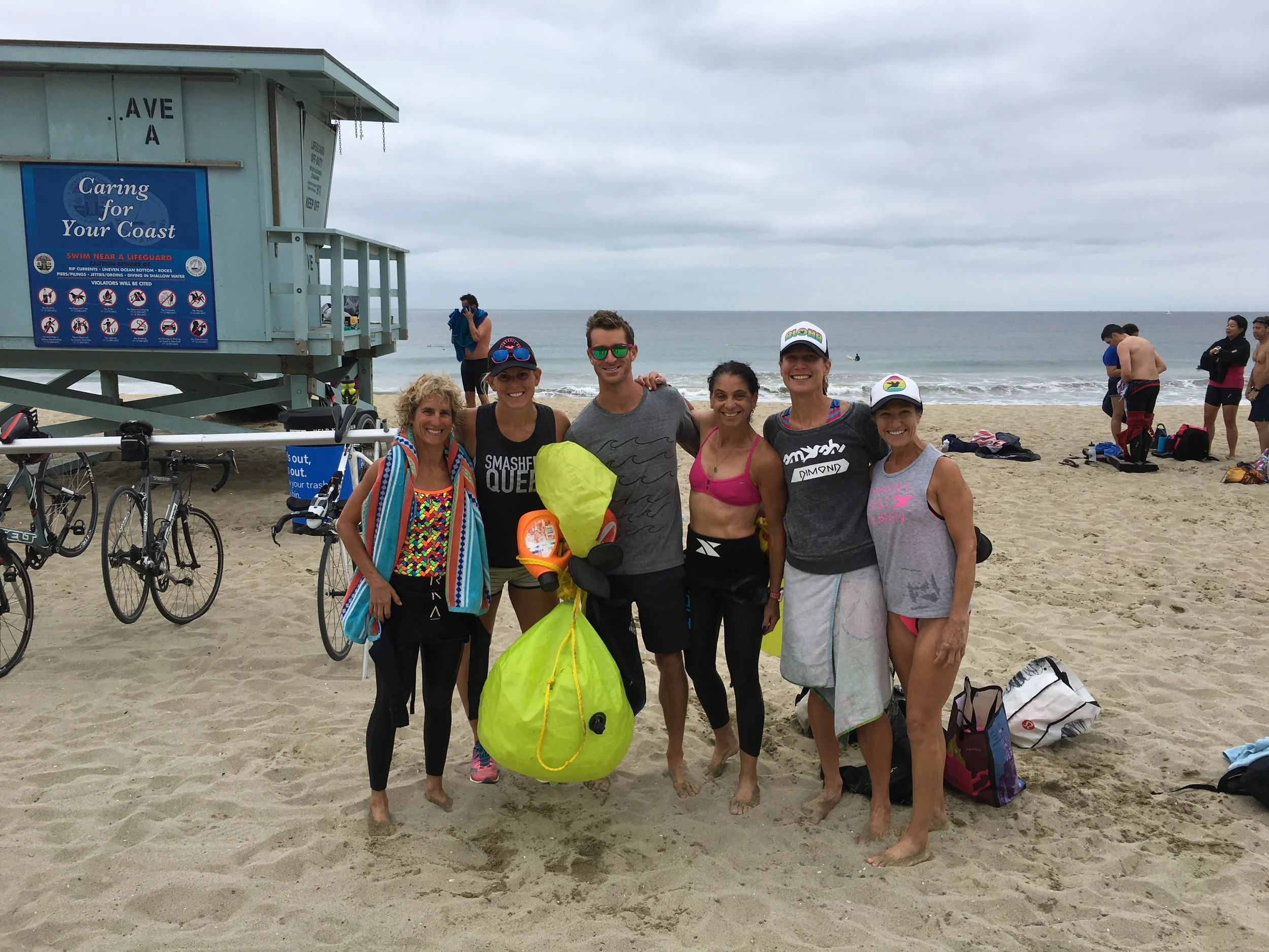 Post SMOG swim. Starting from screen left, Lynne Fielder, Hillary Biscay, Bryan Mineo, Jenn Aronson, a local, and Lynne Caraway.