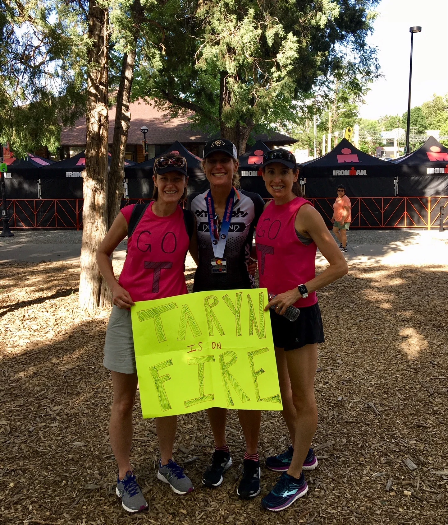 My best friends on earth, from left, Emily Tweten, a sweaty Ironwoman, and Hadara Katarski.