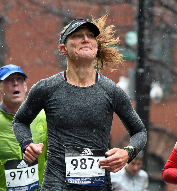 Running through tears and raindrops down Boylston Ave. on a very windy and rainy day in Boston, 2018.