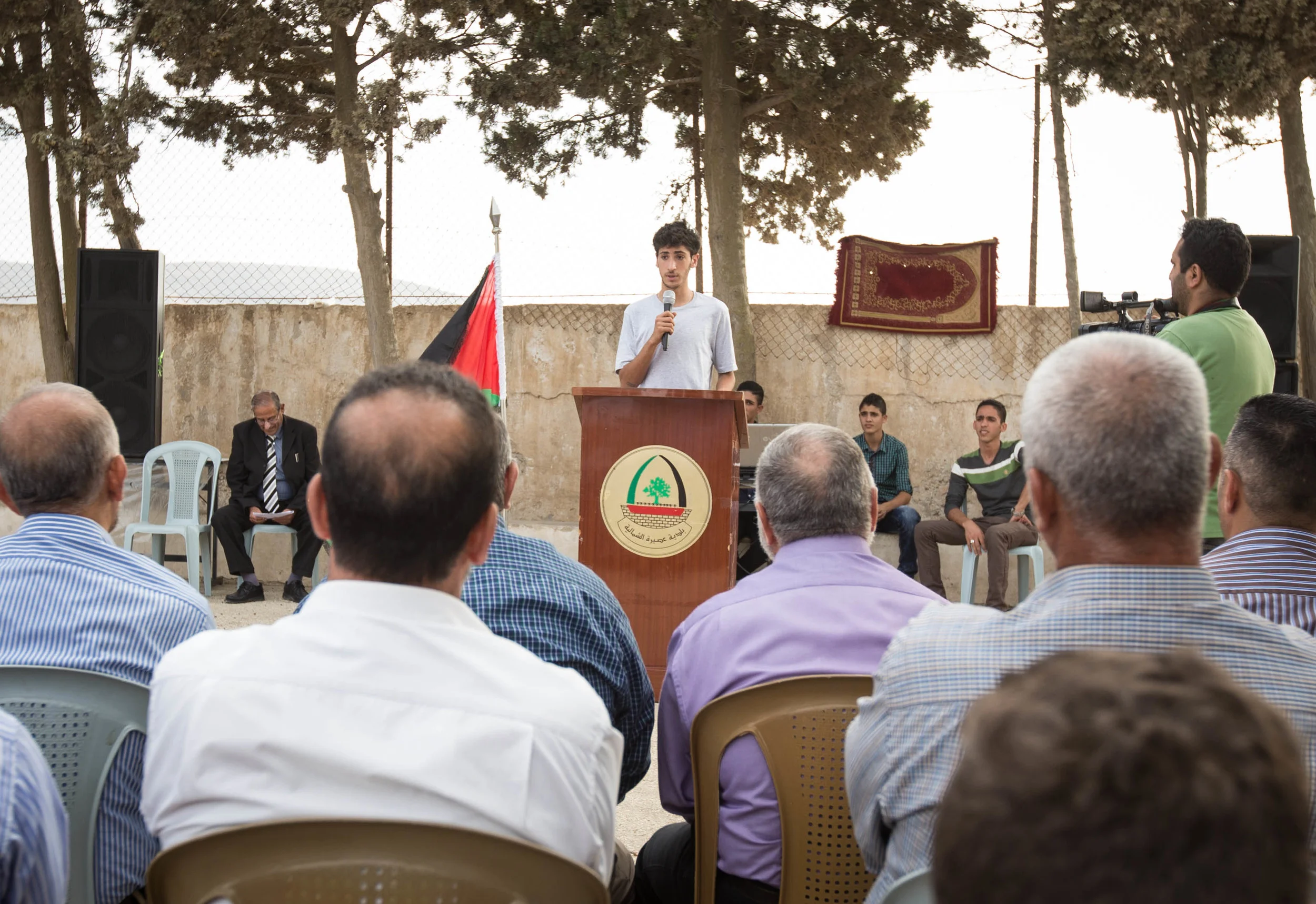 Aram addresses the crowd during the opening of Rosa Park, 2015. 