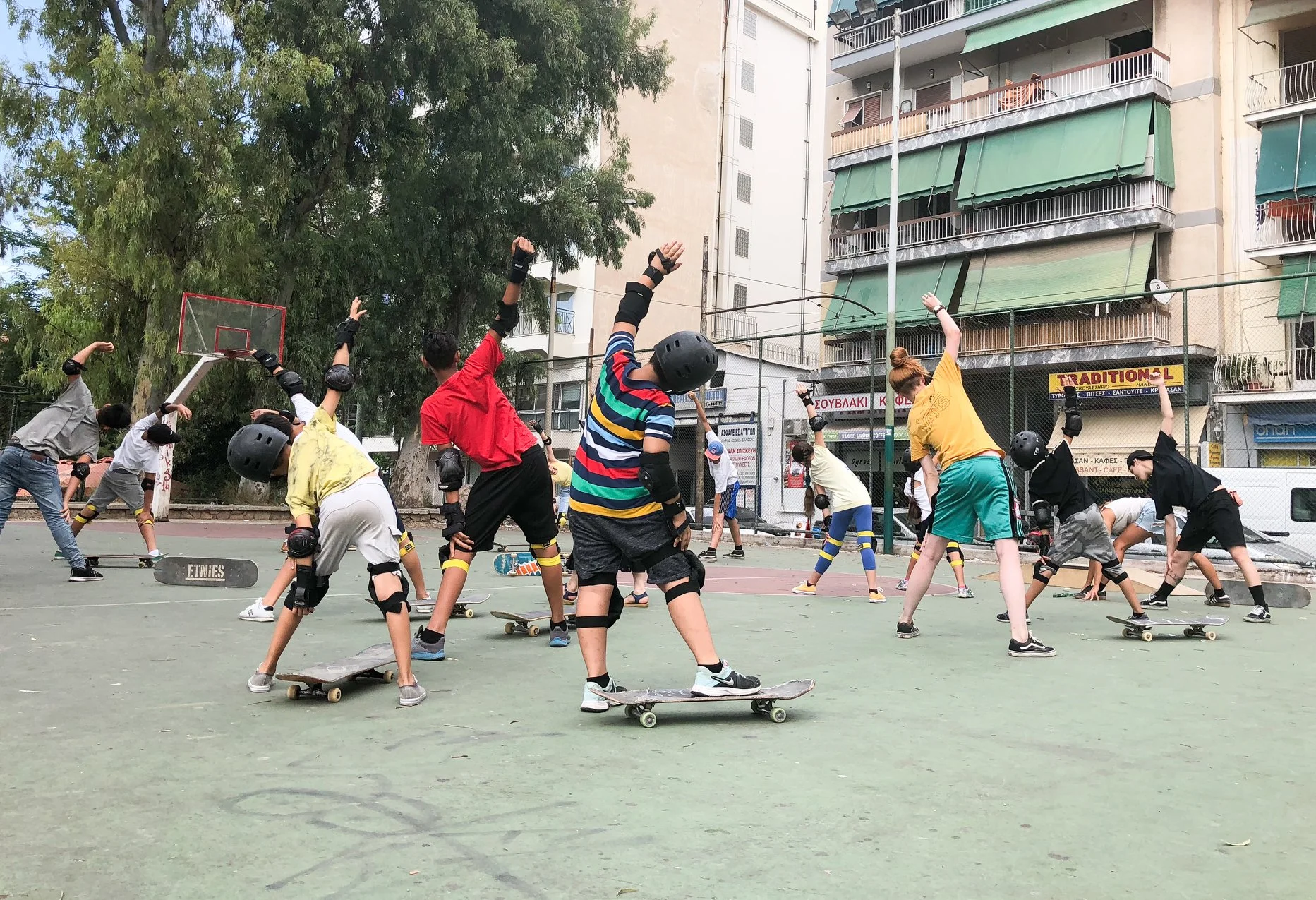 Will leads a stretching session before skating begins. Athens, 2017.