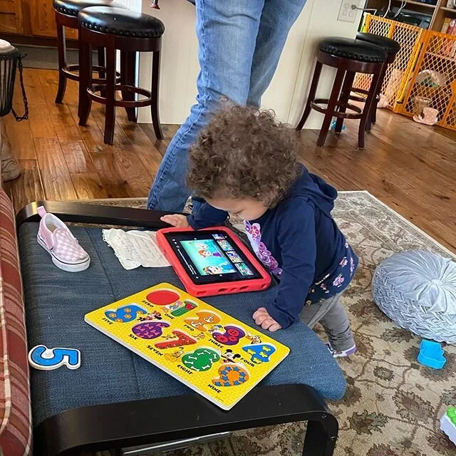 She calls the iPad Melmo because Elmo is on it and I don&rsquo;t feel bad one tiny bit about it. #survivingquarantine #quarantinewithtoddlers